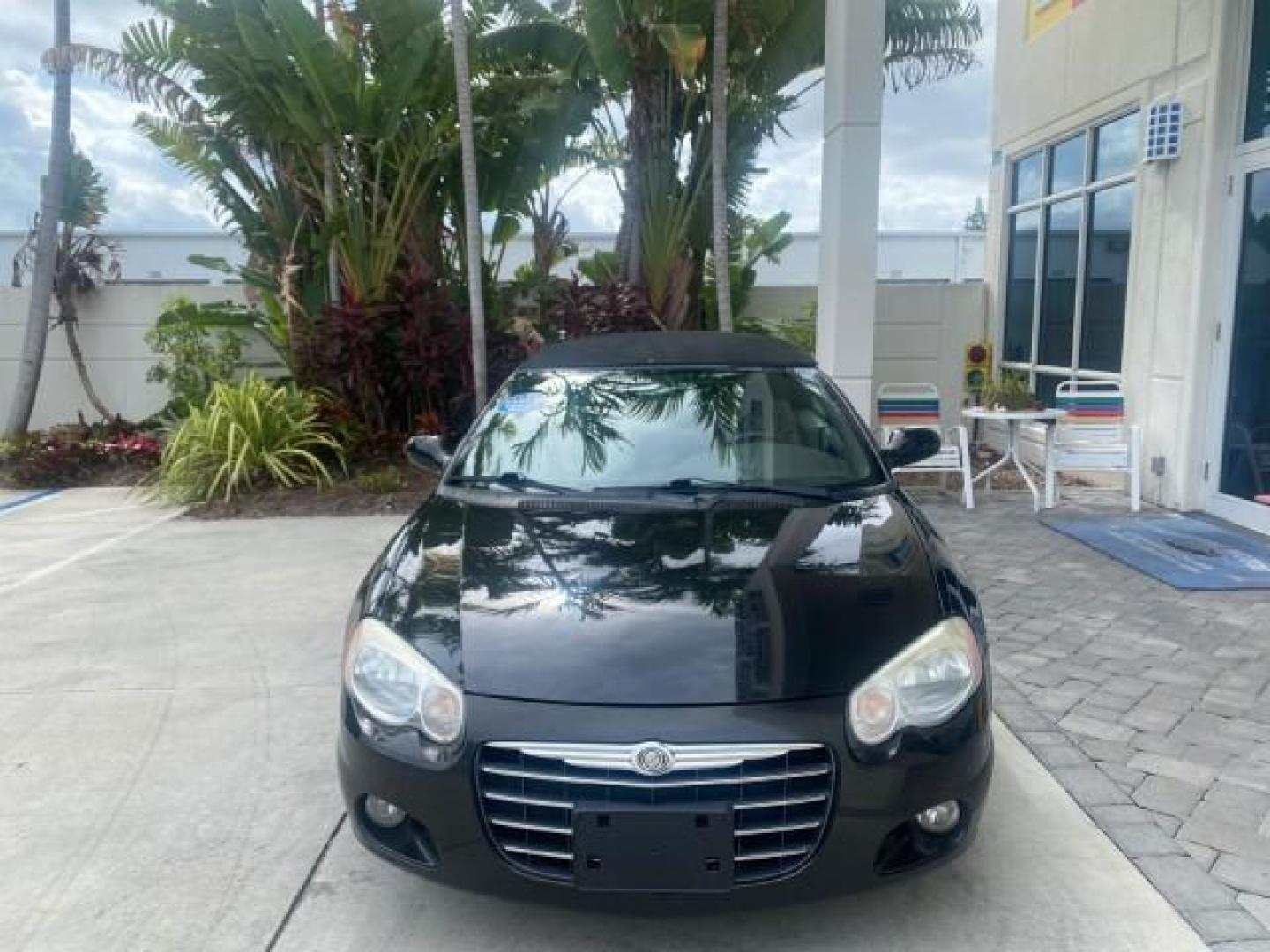 2004 Brilliant Black Crystal Prl /Dark Slate Gray Chrysler Sebring Limited LOW MILES 66,139 (1C3EL65R84N) with an 2.7L MPI DOHC 24-Valve V6 Engine engine, Automatic transmission, located at 4701 North Dixie Hwy, Pompano Beach, FL, 33064, (954) 422-2889, 26.240938, -80.123474 - OUR WEBPAGE FLORIDACARS1.COM HAS OVER 100 PHOTOS AND FREE CARFAX LINK 2004 CHRYSLER SEBRING LIMITED VIN: 1C3EL65R84N154413 1 C 3 E L 6 5 R 8 4 N 1 5 4 4 1 3 CONVERTIBLE 2.7L V6 F DOHC GASOLINE 28 MPG FRONT WHEEL DRIVE Features ABS Brakes Air Conditioning Alloy Wheels AM/FM Stereo Automatic Transmiss - Photo#2