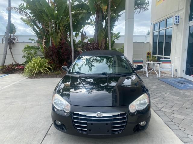 2004 Brilliant Black Crystal Prl /Dark Slate Gray Chrysler Sebring Limited LOW MILES 66,139 (1C3EL65R84N) with an 2.7L MPI DOHC 24-Valve V6 Engine engine, Automatic transmission, located at 4701 North Dixie Hwy, Pompano Beach, FL, 33064, (954) 422-2889, 26.240938, -80.123474 - OUR WEBPAGE FLORIDACARS1.COM HAS OVER 100 PHOTOS AND FREE CARFAX LINK 2004 CHRYSLER SEBRING LIMITED VIN: 1C3EL65R84N154413 1 C 3 E L 6 5 R 8 4 N 1 5 4 4 1 3 CONVERTIBLE 2.7L V6 F DOHC GASOLINE 28 MPG FRONT WHEEL DRIVE Features ABS Brakes Air Conditioning Alloy Wheels AM/FM Stereo Automatic Transmiss - Photo#2