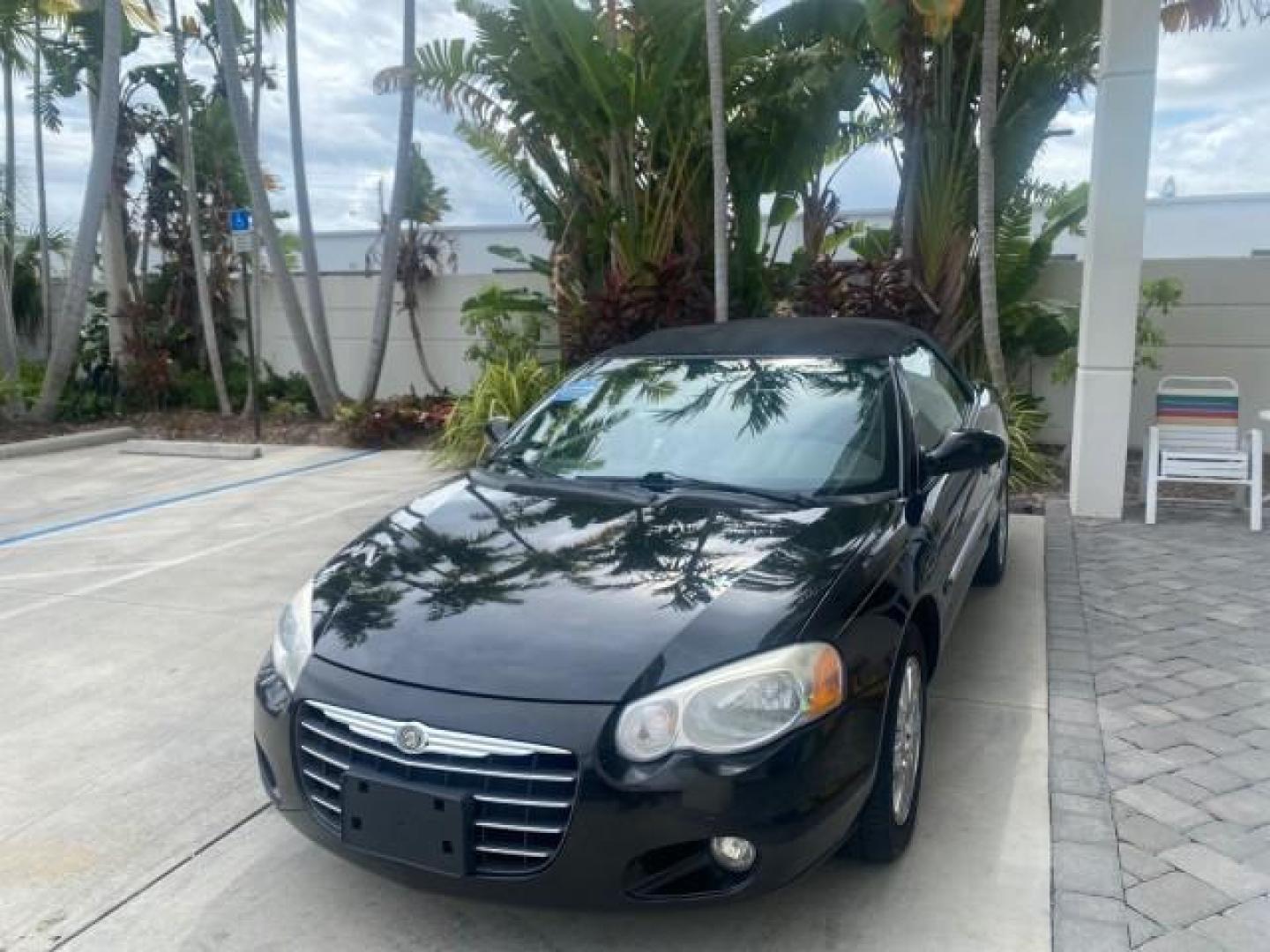 2004 Brilliant Black Crystal Prl /Dark Slate Gray Chrysler Sebring Limited LOW MILES 66,139 (1C3EL65R84N) with an 2.7L MPI DOHC 24-Valve V6 Engine engine, Automatic transmission, located at 4701 North Dixie Hwy, Pompano Beach, FL, 33064, (954) 422-2889, 26.240938, -80.123474 - OUR WEBPAGE FLORIDACARS1.COM HAS OVER 100 PHOTOS AND FREE CARFAX LINK 2004 CHRYSLER SEBRING LIMITED VIN: 1C3EL65R84N154413 1 C 3 E L 6 5 R 8 4 N 1 5 4 4 1 3 CONVERTIBLE 2.7L V6 F DOHC GASOLINE 28 MPG FRONT WHEEL DRIVE Features ABS Brakes Air Conditioning Alloy Wheels AM/FM Stereo Automatic Transmiss - Photo#3