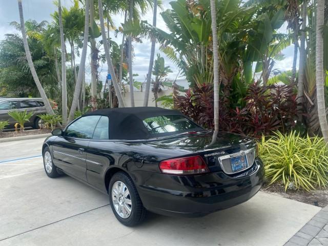 2004 Brilliant Black Crystal Prl /Dark Slate Gray Chrysler Sebring Limited LOW MILES 66,139 (1C3EL65R84N) with an 2.7L MPI DOHC 24-Valve V6 Engine engine, Automatic transmission, located at 4701 North Dixie Hwy, Pompano Beach, FL, 33064, (954) 422-2889, 26.240938, -80.123474 - OUR WEBPAGE FLORIDACARS1.COM HAS OVER 100 PHOTOS AND FREE CARFAX LINK 2004 CHRYSLER SEBRING LIMITED VIN: 1C3EL65R84N154413 1 C 3 E L 6 5 R 8 4 N 1 5 4 4 1 3 CONVERTIBLE 2.7L V6 F DOHC GASOLINE 28 MPG FRONT WHEEL DRIVE Features ABS Brakes Air Conditioning Alloy Wheels AM/FM Stereo Automatic Transmiss - Photo#5