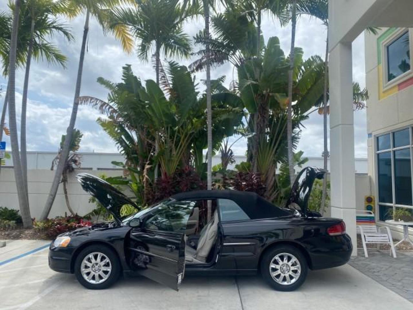 2004 Brilliant Black Crystal Prl /Dark Slate Gray Chrysler Sebring Limited LOW MILES 66,139 (1C3EL65R84N) with an 2.7L MPI DOHC 24-Valve V6 Engine engine, Automatic transmission, located at 4701 North Dixie Hwy, Pompano Beach, FL, 33064, (954) 422-2889, 26.240938, -80.123474 - OUR WEBPAGE FLORIDACARS1.COM HAS OVER 100 PHOTOS AND FREE CARFAX LINK 2004 CHRYSLER SEBRING LIMITED VIN: 1C3EL65R84N154413 1 C 3 E L 6 5 R 8 4 N 1 5 4 4 1 3 CONVERTIBLE 2.7L V6 F DOHC GASOLINE 28 MPG FRONT WHEEL DRIVE Features ABS Brakes Air Conditioning Alloy Wheels AM/FM Stereo Automatic Transmiss - Photo#8