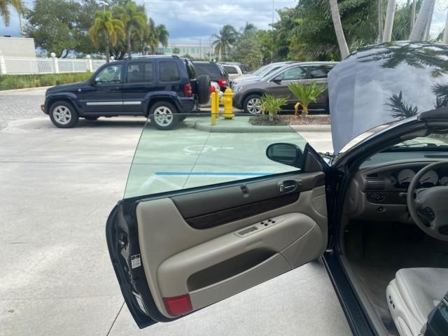 2004 Brilliant Black Crystal Prl /Dark Slate Gray Chrysler Sebring Limited LOW MILES 66,139 (1C3EL65R84N) with an 2.7L MPI DOHC 24-Valve V6 Engine engine, Automatic transmission, located at 4701 North Dixie Hwy, Pompano Beach, FL, 33064, (954) 422-2889, 26.240938, -80.123474 - OUR WEBPAGE FLORIDACARS1.COM HAS OVER 100 PHOTOS AND FREE CARFAX LINK 2004 CHRYSLER SEBRING LIMITED VIN: 1C3EL65R84N154413 1 C 3 E L 6 5 R 8 4 N 1 5 4 4 1 3 CONVERTIBLE 2.7L V6 F DOHC GASOLINE 28 MPG FRONT WHEEL DRIVE Features ABS Brakes Air Conditioning Alloy Wheels AM/FM Stereo Automatic Transmiss - Photo#9