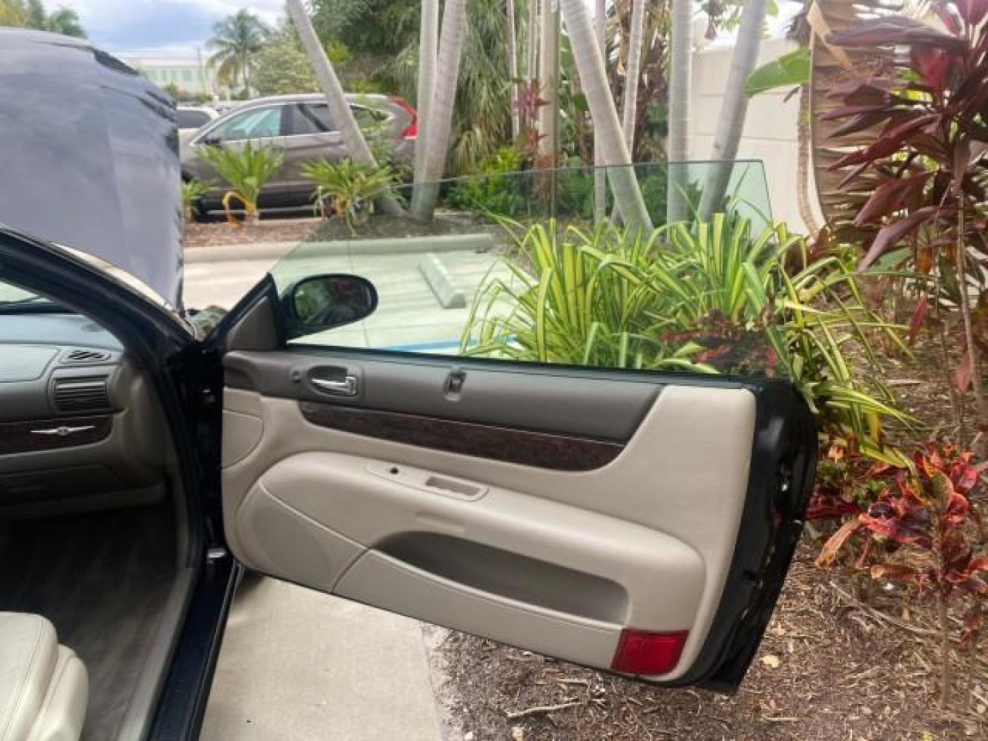 2004 Brilliant Black Crystal Prl /Dark Slate Gray Chrysler Sebring Limited LOW MILES 66,139 (1C3EL65R84N) with an 2.7L MPI DOHC 24-Valve V6 Engine engine, Automatic transmission, located at 4701 North Dixie Hwy, Pompano Beach, FL, 33064, (954) 422-2889, 26.240938, -80.123474 - OUR WEBPAGE FLORIDACARS1.COM HAS OVER 100 PHOTOS AND FREE CARFAX LINK 2004 CHRYSLER SEBRING LIMITED VIN: 1C3EL65R84N154413 1 C 3 E L 6 5 R 8 4 N 1 5 4 4 1 3 CONVERTIBLE 2.7L V6 F DOHC GASOLINE 28 MPG FRONT WHEEL DRIVE Features ABS Brakes Air Conditioning Alloy Wheels AM/FM Stereo Automatic Transmiss - Photo#11