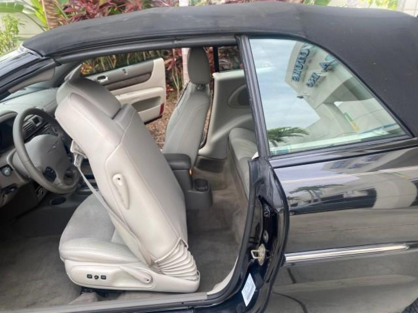 2004 Brilliant Black Crystal Prl /Dark Slate Gray Chrysler Sebring Limited LOW MILES 66,139 (1C3EL65R84N) with an 2.7L MPI DOHC 24-Valve V6 Engine engine, Automatic transmission, located at 4701 North Dixie Hwy, Pompano Beach, FL, 33064, (954) 422-2889, 26.240938, -80.123474 - OUR WEBPAGE FLORIDACARS1.COM HAS OVER 100 PHOTOS AND FREE CARFAX LINK 2004 CHRYSLER SEBRING LIMITED VIN: 1C3EL65R84N154413 1 C 3 E L 6 5 R 8 4 N 1 5 4 4 1 3 CONVERTIBLE 2.7L V6 F DOHC GASOLINE 28 MPG FRONT WHEEL DRIVE Features ABS Brakes Air Conditioning Alloy Wheels AM/FM Stereo Automatic Transmiss - Photo#13