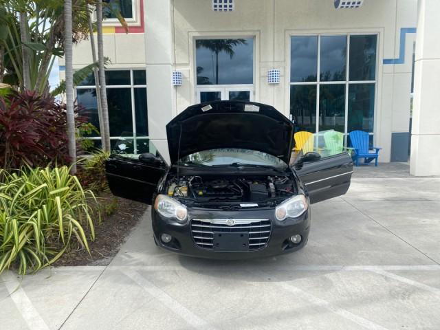 2004 Brilliant Black Crystal Prl /Dark Slate Gray Chrysler Sebring Limited LOW MILES 66,139 (1C3EL65R84N) with an 2.7L MPI DOHC 24-Valve V6 Engine engine, Automatic transmission, located at 4701 North Dixie Hwy, Pompano Beach, FL, 33064, (954) 422-2889, 26.240938, -80.123474 - OUR WEBPAGE FLORIDACARS1.COM HAS OVER 100 PHOTOS AND FREE CARFAX LINK 2004 CHRYSLER SEBRING LIMITED VIN: 1C3EL65R84N154413 1 C 3 E L 6 5 R 8 4 N 1 5 4 4 1 3 CONVERTIBLE 2.7L V6 F DOHC GASOLINE 28 MPG FRONT WHEEL DRIVE Features ABS Brakes Air Conditioning Alloy Wheels AM/FM Stereo Automatic Transmiss - Photo#16