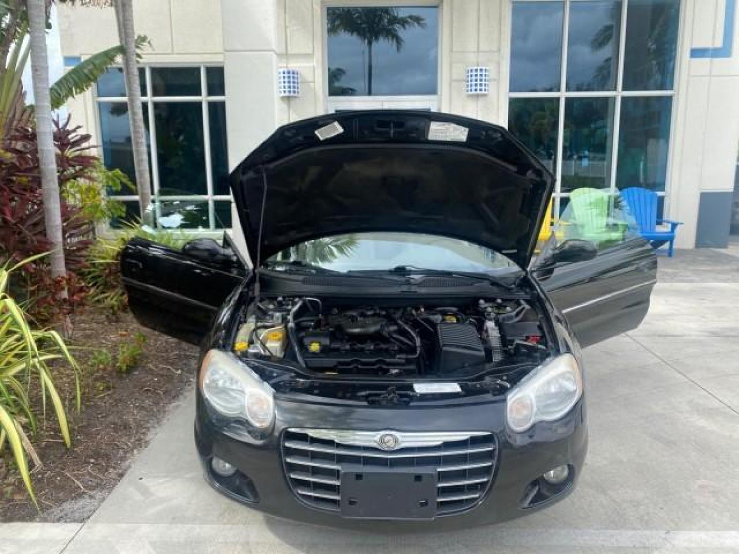 2004 Brilliant Black Crystal Prl /Dark Slate Gray Chrysler Sebring Limited LOW MILES 66,139 (1C3EL65R84N) with an 2.7L MPI DOHC 24-Valve V6 Engine engine, Automatic transmission, located at 4701 North Dixie Hwy, Pompano Beach, FL, 33064, (954) 422-2889, 26.240938, -80.123474 - OUR WEBPAGE FLORIDACARS1.COM HAS OVER 100 PHOTOS AND FREE CARFAX LINK 2004 CHRYSLER SEBRING LIMITED VIN: 1C3EL65R84N154413 1 C 3 E L 6 5 R 8 4 N 1 5 4 4 1 3 CONVERTIBLE 2.7L V6 F DOHC GASOLINE 28 MPG FRONT WHEEL DRIVE Features ABS Brakes Air Conditioning Alloy Wheels AM/FM Stereo Automatic Transmiss - Photo#17