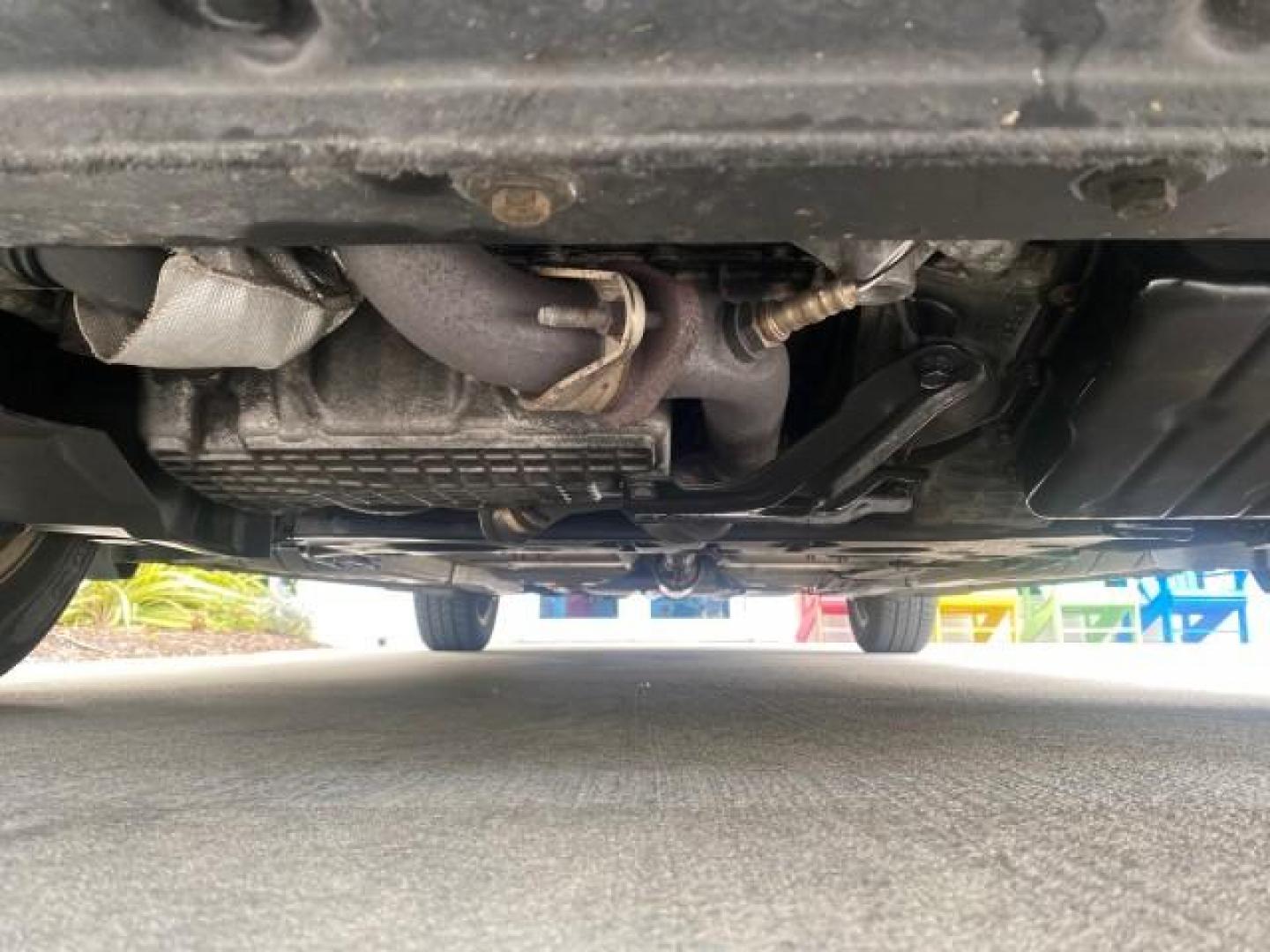 2004 Brilliant Black Crystal Prl /Dark Slate Gray Chrysler Sebring Limited LOW MILES 66,139 (1C3EL65R84N) with an 2.7L MPI DOHC 24-Valve V6 Engine engine, Automatic transmission, located at 4701 North Dixie Hwy, Pompano Beach, FL, 33064, (954) 422-2889, 26.240938, -80.123474 - OUR WEBPAGE FLORIDACARS1.COM HAS OVER 100 PHOTOS AND FREE CARFAX LINK 2004 CHRYSLER SEBRING LIMITED VIN: 1C3EL65R84N154413 1 C 3 E L 6 5 R 8 4 N 1 5 4 4 1 3 CONVERTIBLE 2.7L V6 F DOHC GASOLINE 28 MPG FRONT WHEEL DRIVE Features ABS Brakes Air Conditioning Alloy Wheels AM/FM Stereo Automatic Transmiss - Photo#21