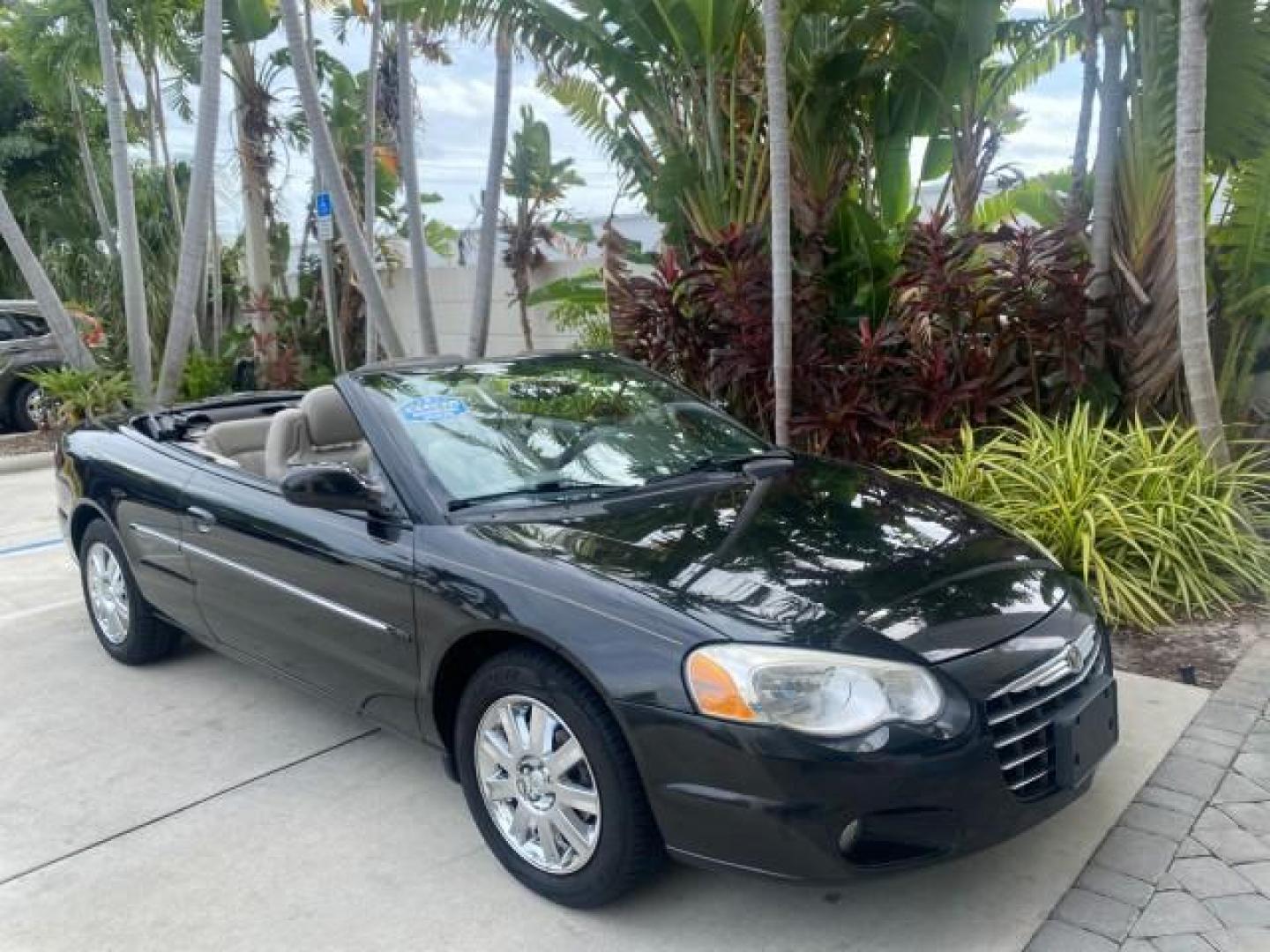 2004 Brilliant Black Crystal Prl /Dark Slate Gray Chrysler Sebring Limited LOW MILES 66,139 (1C3EL65R84N) with an 2.7L MPI DOHC 24-Valve V6 Engine engine, Automatic transmission, located at 4701 North Dixie Hwy, Pompano Beach, FL, 33064, (954) 422-2889, 26.240938, -80.123474 - OUR WEBPAGE FLORIDACARS1.COM HAS OVER 100 PHOTOS AND FREE CARFAX LINK 2004 CHRYSLER SEBRING LIMITED VIN: 1C3EL65R84N154413 1 C 3 E L 6 5 R 8 4 N 1 5 4 4 1 3 CONVERTIBLE 2.7L V6 F DOHC GASOLINE 28 MPG FRONT WHEEL DRIVE Features ABS Brakes Air Conditioning Alloy Wheels AM/FM Stereo Automatic Transmiss - Photo#24