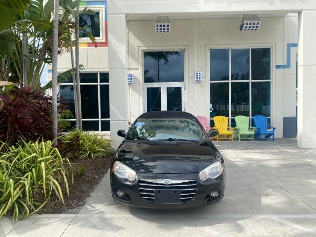 2004 Brilliant Black Crystal Prl /Dark Slate Gray Chrysler Sebring Limited LOW MILES 66,139 (1C3EL65R84N) with an 2.7L MPI DOHC 24-Valve V6 Engine engine, Automatic transmission, located at 4701 North Dixie Hwy, Pompano Beach, FL, 33064, (954) 422-2889, 26.240938, -80.123474 - OUR WEBPAGE FLORIDACARS1.COM HAS OVER 100 PHOTOS AND FREE CARFAX LINK 2004 CHRYSLER SEBRING LIMITED VIN: 1C3EL65R84N154413 1 C 3 E L 6 5 R 8 4 N 1 5 4 4 1 3 CONVERTIBLE 2.7L V6 F DOHC GASOLINE 28 MPG FRONT WHEEL DRIVE Features ABS Brakes Air Conditioning Alloy Wheels AM/FM Stereo Automatic Transmiss - Photo#27