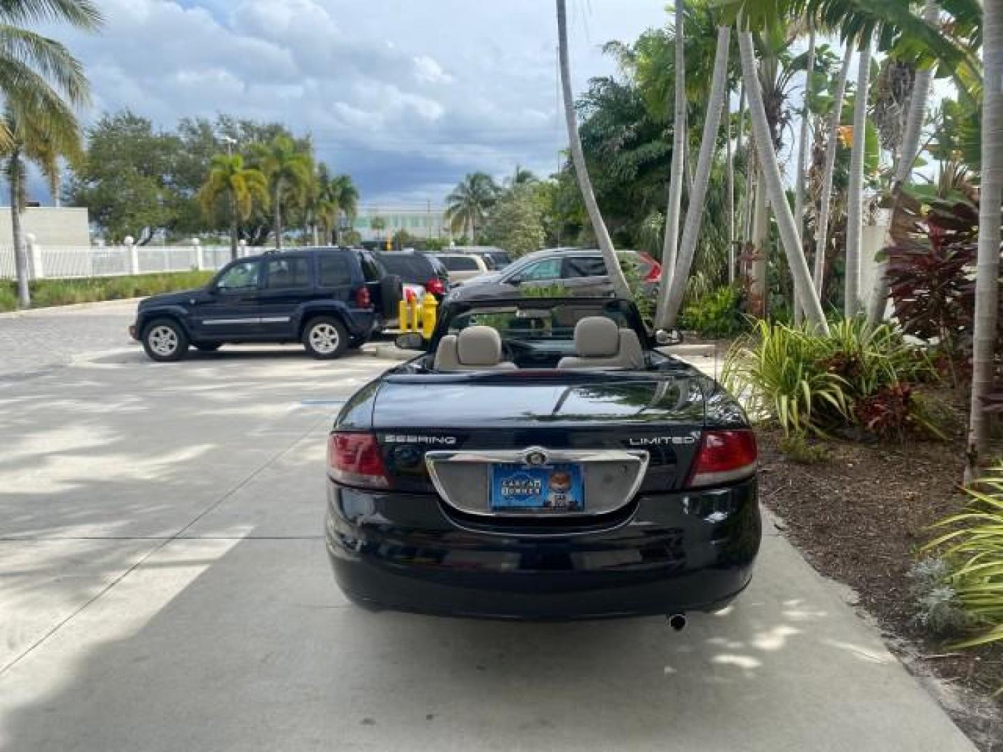 2004 Brilliant Black Crystal Prl /Dark Slate Gray Chrysler Sebring Limited LOW MILES 66,139 (1C3EL65R84N) with an 2.7L MPI DOHC 24-Valve V6 Engine engine, Automatic transmission, located at 4701 North Dixie Hwy, Pompano Beach, FL, 33064, (954) 422-2889, 26.240938, -80.123474 - OUR WEBPAGE FLORIDACARS1.COM HAS OVER 100 PHOTOS AND FREE CARFAX LINK 2004 CHRYSLER SEBRING LIMITED VIN: 1C3EL65R84N154413 1 C 3 E L 6 5 R 8 4 N 1 5 4 4 1 3 CONVERTIBLE 2.7L V6 F DOHC GASOLINE 28 MPG FRONT WHEEL DRIVE Features ABS Brakes Air Conditioning Alloy Wheels AM/FM Stereo Automatic Transmiss - Photo#44