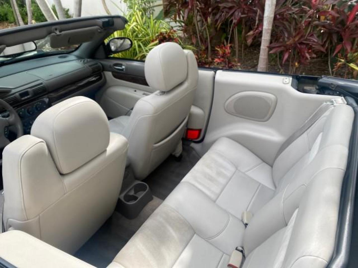 2004 Brilliant Black Crystal Prl /Dark Slate Gray Chrysler Sebring Limited LOW MILES 66,139 (1C3EL65R84N) with an 2.7L MPI DOHC 24-Valve V6 Engine engine, Automatic transmission, located at 4701 North Dixie Hwy, Pompano Beach, FL, 33064, (954) 422-2889, 26.240938, -80.123474 - OUR WEBPAGE FLORIDACARS1.COM HAS OVER 100 PHOTOS AND FREE CARFAX LINK 2004 CHRYSLER SEBRING LIMITED VIN: 1C3EL65R84N154413 1 C 3 E L 6 5 R 8 4 N 1 5 4 4 1 3 CONVERTIBLE 2.7L V6 F DOHC GASOLINE 28 MPG FRONT WHEEL DRIVE Features ABS Brakes Air Conditioning Alloy Wheels AM/FM Stereo Automatic Transmiss - Photo#48