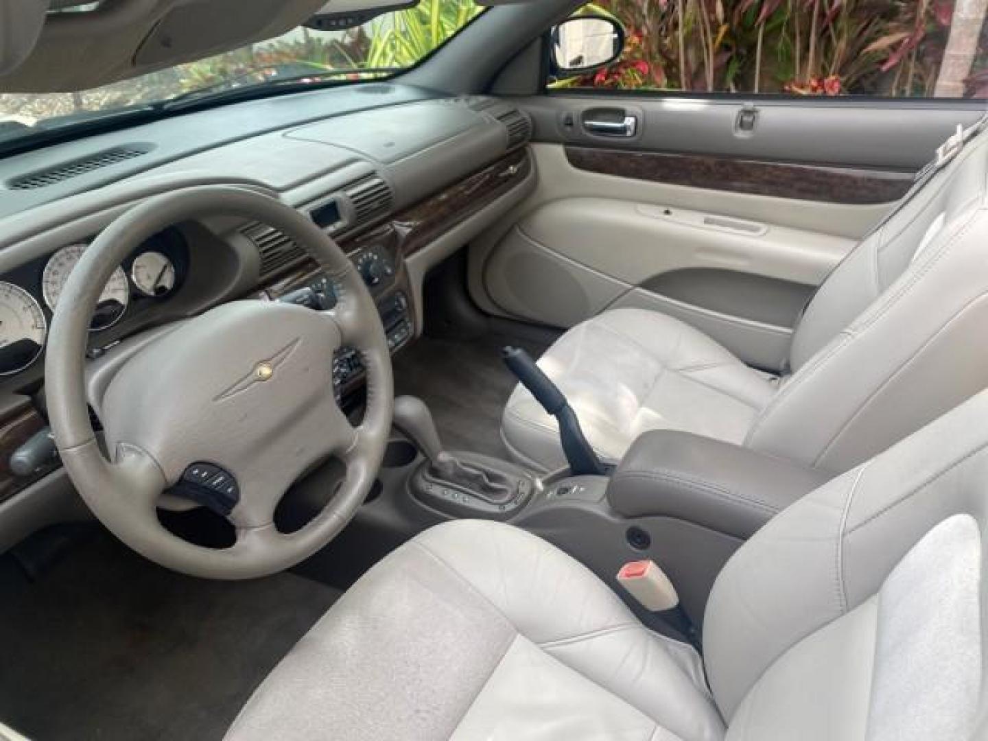 2004 Brilliant Black Crystal Prl /Dark Slate Gray Chrysler Sebring Limited LOW MILES 66,139 (1C3EL65R84N) with an 2.7L MPI DOHC 24-Valve V6 Engine engine, Automatic transmission, located at 4701 North Dixie Hwy, Pompano Beach, FL, 33064, (954) 422-2889, 26.240938, -80.123474 - OUR WEBPAGE FLORIDACARS1.COM HAS OVER 100 PHOTOS AND FREE CARFAX LINK 2004 CHRYSLER SEBRING LIMITED VIN: 1C3EL65R84N154413 1 C 3 E L 6 5 R 8 4 N 1 5 4 4 1 3 CONVERTIBLE 2.7L V6 F DOHC GASOLINE 28 MPG FRONT WHEEL DRIVE Features ABS Brakes Air Conditioning Alloy Wheels AM/FM Stereo Automatic Transmiss - Photo#50