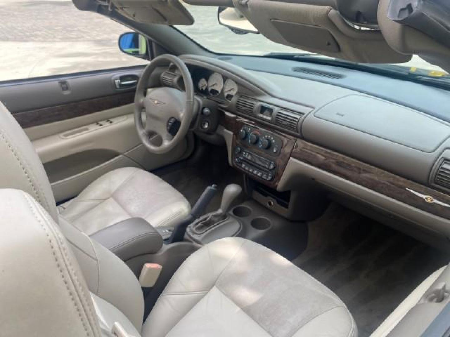 2004 Brilliant Black Crystal Prl /Dark Slate Gray Chrysler Sebring Limited LOW MILES 66,139 (1C3EL65R84N) with an 2.7L MPI DOHC 24-Valve V6 Engine engine, Automatic transmission, located at 4701 North Dixie Hwy, Pompano Beach, FL, 33064, (954) 422-2889, 26.240938, -80.123474 - OUR WEBPAGE FLORIDACARS1.COM HAS OVER 100 PHOTOS AND FREE CARFAX LINK 2004 CHRYSLER SEBRING LIMITED VIN: 1C3EL65R84N154413 1 C 3 E L 6 5 R 8 4 N 1 5 4 4 1 3 CONVERTIBLE 2.7L V6 F DOHC GASOLINE 28 MPG FRONT WHEEL DRIVE Features ABS Brakes Air Conditioning Alloy Wheels AM/FM Stereo Automatic Transmiss - Photo#55