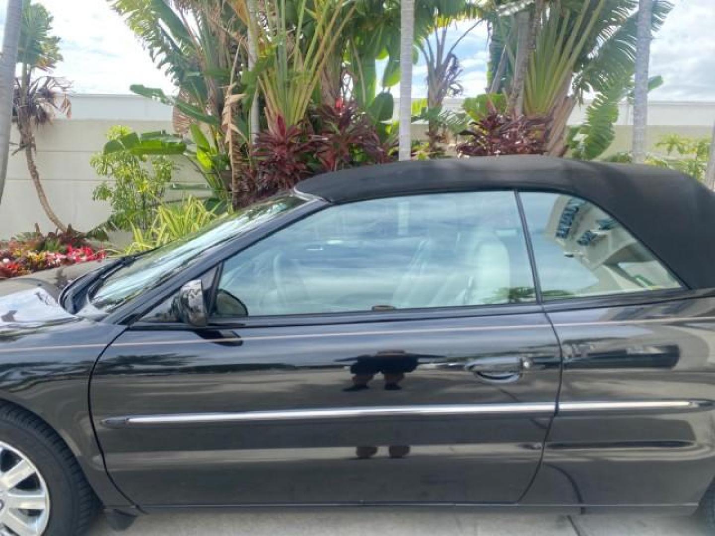 2004 Brilliant Black Crystal Prl /Dark Slate Gray Chrysler Sebring Limited LOW MILES 66,139 (1C3EL65R84N) with an 2.7L MPI DOHC 24-Valve V6 Engine engine, Automatic transmission, located at 4701 North Dixie Hwy, Pompano Beach, FL, 33064, (954) 422-2889, 26.240938, -80.123474 - OUR WEBPAGE FLORIDACARS1.COM HAS OVER 100 PHOTOS AND FREE CARFAX LINK 2004 CHRYSLER SEBRING LIMITED VIN: 1C3EL65R84N154413 1 C 3 E L 6 5 R 8 4 N 1 5 4 4 1 3 CONVERTIBLE 2.7L V6 F DOHC GASOLINE 28 MPG FRONT WHEEL DRIVE Features ABS Brakes Air Conditioning Alloy Wheels AM/FM Stereo Automatic Transmiss - Photo#58