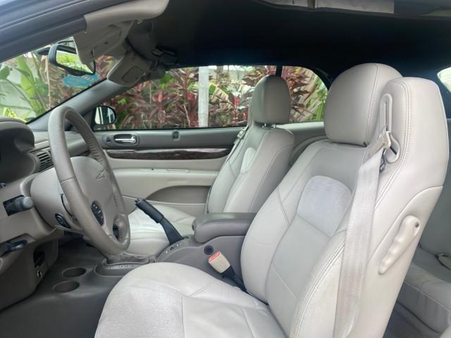 2004 Brilliant Black Crystal Prl /Dark Slate Gray Chrysler Sebring Limited LOW MILES 66,139 (1C3EL65R84N) with an 2.7L MPI DOHC 24-Valve V6 Engine engine, Automatic transmission, located at 4701 North Dixie Hwy, Pompano Beach, FL, 33064, (954) 422-2889, 26.240938, -80.123474 - OUR WEBPAGE FLORIDACARS1.COM HAS OVER 100 PHOTOS AND FREE CARFAX LINK 2004 CHRYSLER SEBRING LIMITED VIN: 1C3EL65R84N154413 1 C 3 E L 6 5 R 8 4 N 1 5 4 4 1 3 CONVERTIBLE 2.7L V6 F DOHC GASOLINE 28 MPG FRONT WHEEL DRIVE Features ABS Brakes Air Conditioning Alloy Wheels AM/FM Stereo Automatic Transmiss - Photo#64