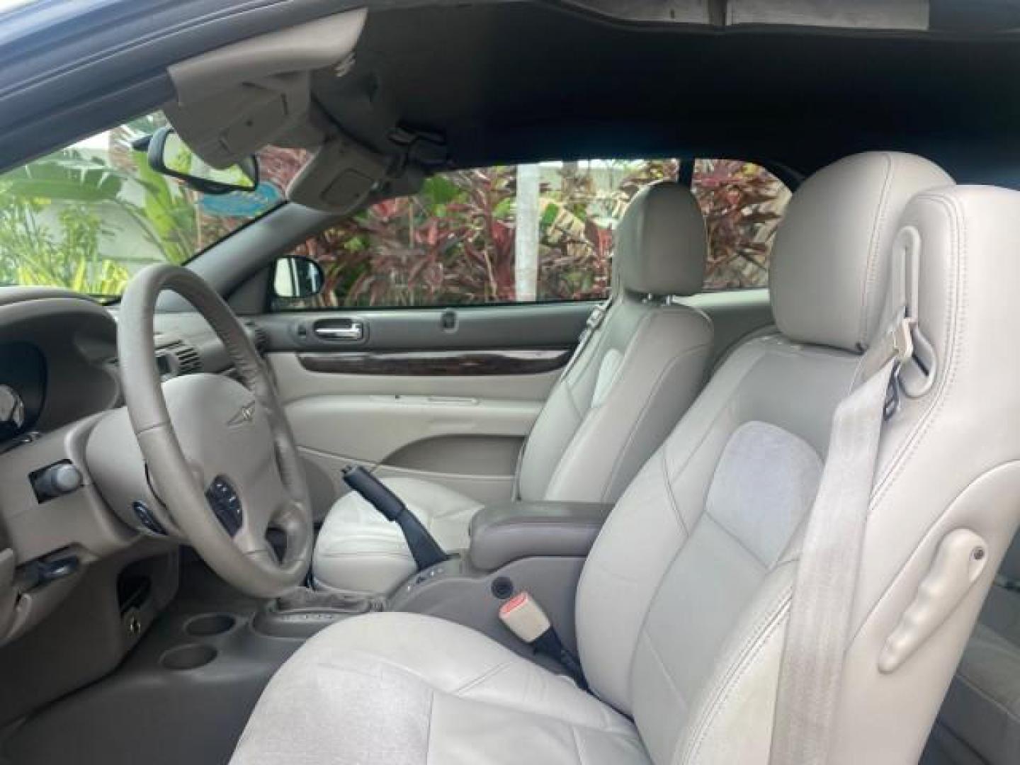 2004 Brilliant Black Crystal Prl /Dark Slate Gray Chrysler Sebring Limited LOW MILES 66,139 (1C3EL65R84N) with an 2.7L MPI DOHC 24-Valve V6 Engine engine, Automatic transmission, located at 4701 North Dixie Hwy, Pompano Beach, FL, 33064, (954) 422-2889, 26.240938, -80.123474 - OUR WEBPAGE FLORIDACARS1.COM HAS OVER 100 PHOTOS AND FREE CARFAX LINK 2004 CHRYSLER SEBRING LIMITED VIN: 1C3EL65R84N154413 1 C 3 E L 6 5 R 8 4 N 1 5 4 4 1 3 CONVERTIBLE 2.7L V6 F DOHC GASOLINE 28 MPG FRONT WHEEL DRIVE Features ABS Brakes Air Conditioning Alloy Wheels AM/FM Stereo Automatic Transmiss - Photo#65