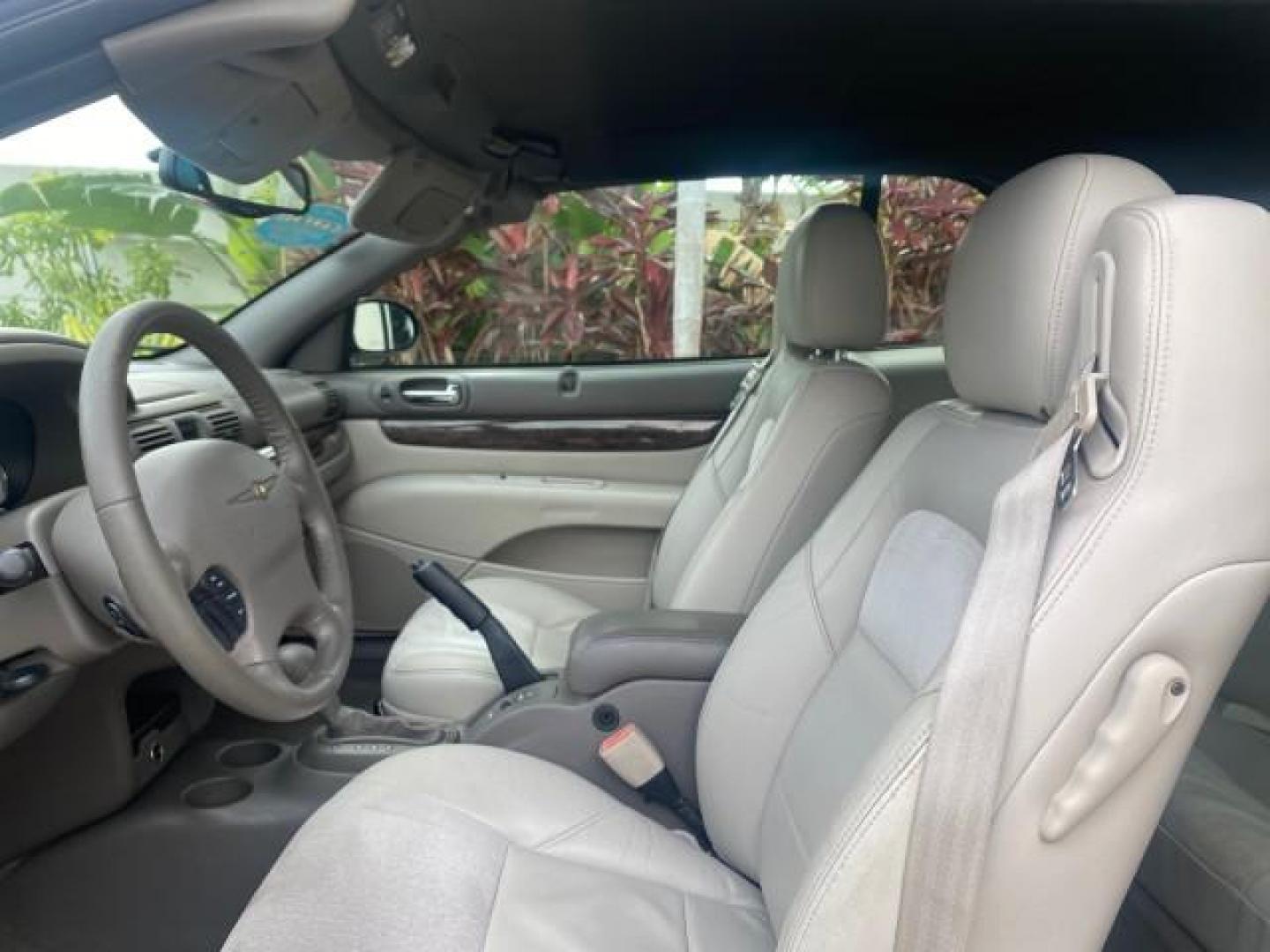 2004 Brilliant Black Crystal Prl /Dark Slate Gray Chrysler Sebring Limited LOW MILES 66,139 (1C3EL65R84N) with an 2.7L MPI DOHC 24-Valve V6 Engine engine, Automatic transmission, located at 4701 North Dixie Hwy, Pompano Beach, FL, 33064, (954) 422-2889, 26.240938, -80.123474 - OUR WEBPAGE FLORIDACARS1.COM HAS OVER 100 PHOTOS AND FREE CARFAX LINK 2004 CHRYSLER SEBRING LIMITED VIN: 1C3EL65R84N154413 1 C 3 E L 6 5 R 8 4 N 1 5 4 4 1 3 CONVERTIBLE 2.7L V6 F DOHC GASOLINE 28 MPG FRONT WHEEL DRIVE Features ABS Brakes Air Conditioning Alloy Wheels AM/FM Stereo Automatic Transmiss - Photo#66