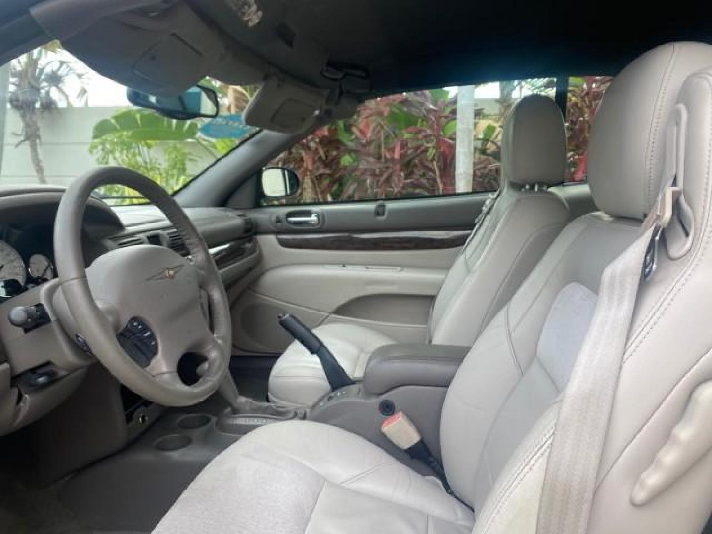 2004 Brilliant Black Crystal Prl /Dark Slate Gray Chrysler Sebring Limited LOW MILES 66,139 (1C3EL65R84N) with an 2.7L MPI DOHC 24-Valve V6 Engine engine, Automatic transmission, located at 4701 North Dixie Hwy, Pompano Beach, FL, 33064, (954) 422-2889, 26.240938, -80.123474 - OUR WEBPAGE FLORIDACARS1.COM HAS OVER 100 PHOTOS AND FREE CARFAX LINK 2004 CHRYSLER SEBRING LIMITED VIN: 1C3EL65R84N154413 1 C 3 E L 6 5 R 8 4 N 1 5 4 4 1 3 CONVERTIBLE 2.7L V6 F DOHC GASOLINE 28 MPG FRONT WHEEL DRIVE Features ABS Brakes Air Conditioning Alloy Wheels AM/FM Stereo Automatic Transmiss - Photo#67