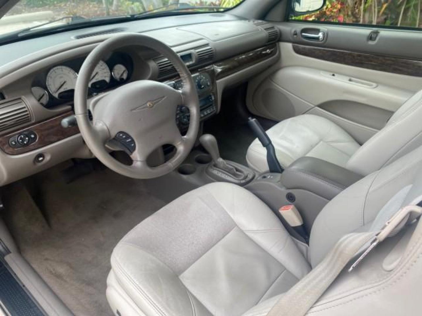 2004 Brilliant Black Crystal Prl /Dark Slate Gray Chrysler Sebring Limited LOW MILES 66,139 (1C3EL65R84N) with an 2.7L MPI DOHC 24-Valve V6 Engine engine, Automatic transmission, located at 4701 North Dixie Hwy, Pompano Beach, FL, 33064, (954) 422-2889, 26.240938, -80.123474 - OUR WEBPAGE FLORIDACARS1.COM HAS OVER 100 PHOTOS AND FREE CARFAX LINK 2004 CHRYSLER SEBRING LIMITED VIN: 1C3EL65R84N154413 1 C 3 E L 6 5 R 8 4 N 1 5 4 4 1 3 CONVERTIBLE 2.7L V6 F DOHC GASOLINE 28 MPG FRONT WHEEL DRIVE Features ABS Brakes Air Conditioning Alloy Wheels AM/FM Stereo Automatic Transmiss - Photo#69