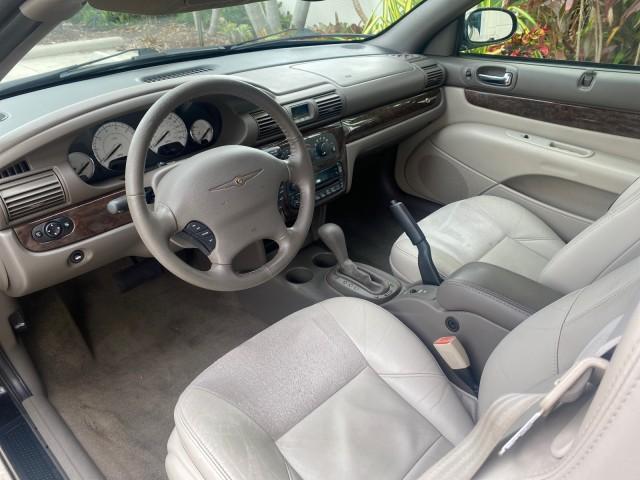 2004 Brilliant Black Crystal Prl /Dark Slate Gray Chrysler Sebring Limited LOW MILES 66,139 (1C3EL65R84N) with an 2.7L MPI DOHC 24-Valve V6 Engine engine, Automatic transmission, located at 4701 North Dixie Hwy, Pompano Beach, FL, 33064, (954) 422-2889, 26.240938, -80.123474 - OUR WEBPAGE FLORIDACARS1.COM HAS OVER 100 PHOTOS AND FREE CARFAX LINK 2004 CHRYSLER SEBRING LIMITED VIN: 1C3EL65R84N154413 1 C 3 E L 6 5 R 8 4 N 1 5 4 4 1 3 CONVERTIBLE 2.7L V6 F DOHC GASOLINE 28 MPG FRONT WHEEL DRIVE Features ABS Brakes Air Conditioning Alloy Wheels AM/FM Stereo Automatic Transmiss - Photo#70