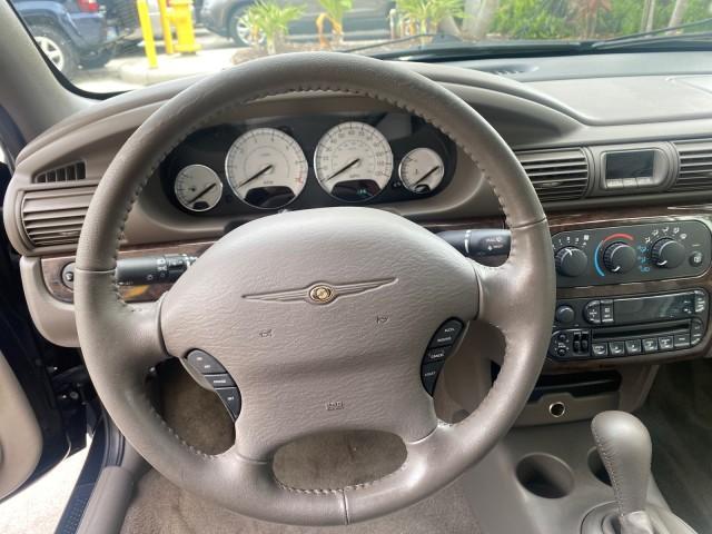 2004 Brilliant Black Crystal Prl /Dark Slate Gray Chrysler Sebring Limited LOW MILES 66,139 (1C3EL65R84N) with an 2.7L MPI DOHC 24-Valve V6 Engine engine, Automatic transmission, located at 4701 North Dixie Hwy, Pompano Beach, FL, 33064, (954) 422-2889, 26.240938, -80.123474 - OUR WEBPAGE FLORIDACARS1.COM HAS OVER 100 PHOTOS AND FREE CARFAX LINK 2004 CHRYSLER SEBRING LIMITED VIN: 1C3EL65R84N154413 1 C 3 E L 6 5 R 8 4 N 1 5 4 4 1 3 CONVERTIBLE 2.7L V6 F DOHC GASOLINE 28 MPG FRONT WHEEL DRIVE Features ABS Brakes Air Conditioning Alloy Wheels AM/FM Stereo Automatic Transmiss - Photo#71