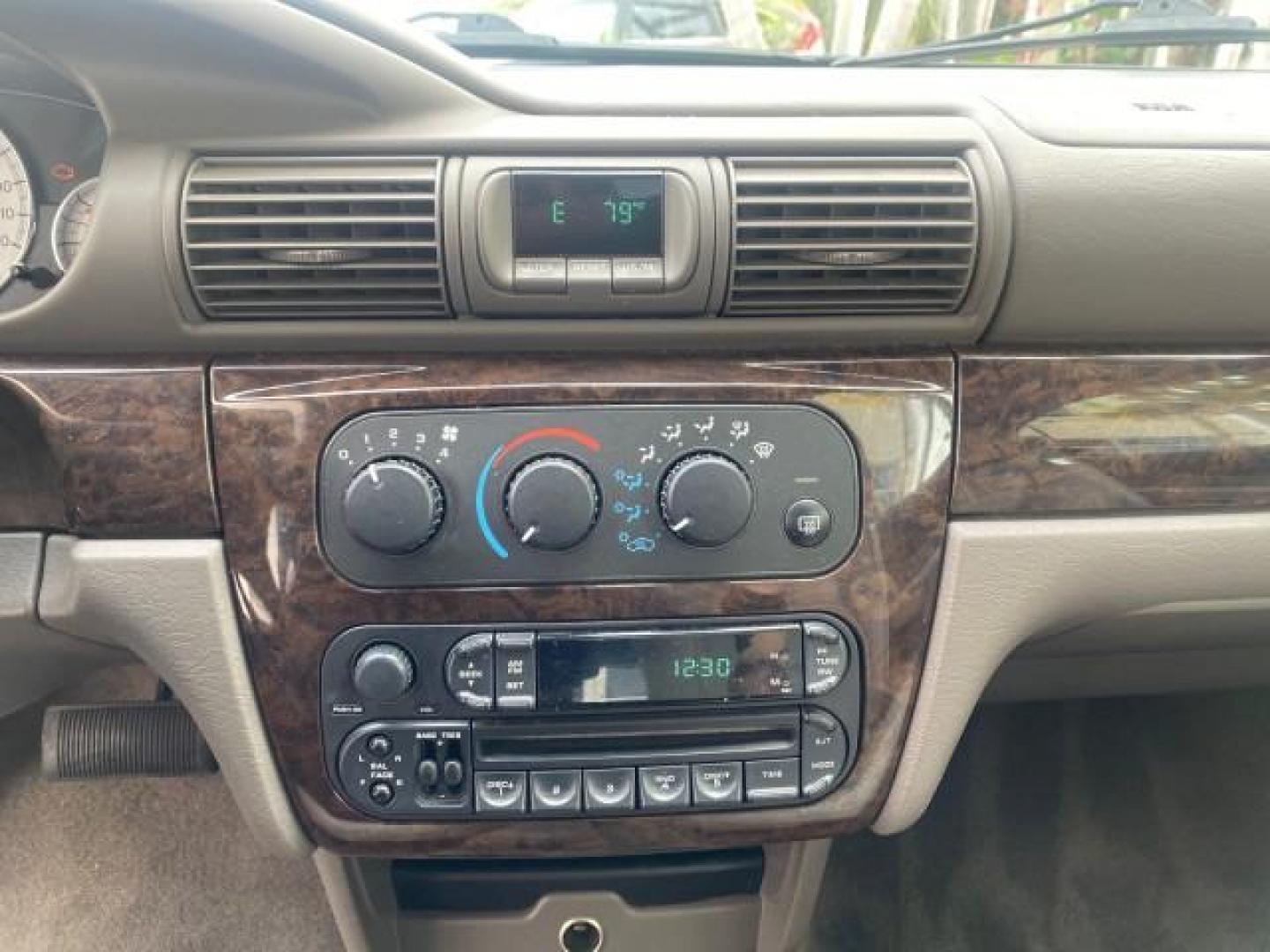 2004 Brilliant Black Crystal Prl /Dark Slate Gray Chrysler Sebring Limited LOW MILES 66,139 (1C3EL65R84N) with an 2.7L MPI DOHC 24-Valve V6 Engine engine, Automatic transmission, located at 4701 North Dixie Hwy, Pompano Beach, FL, 33064, (954) 422-2889, 26.240938, -80.123474 - OUR WEBPAGE FLORIDACARS1.COM HAS OVER 100 PHOTOS AND FREE CARFAX LINK 2004 CHRYSLER SEBRING LIMITED VIN: 1C3EL65R84N154413 1 C 3 E L 6 5 R 8 4 N 1 5 4 4 1 3 CONVERTIBLE 2.7L V6 F DOHC GASOLINE 28 MPG FRONT WHEEL DRIVE Features ABS Brakes Air Conditioning Alloy Wheels AM/FM Stereo Automatic Transmiss - Photo#79