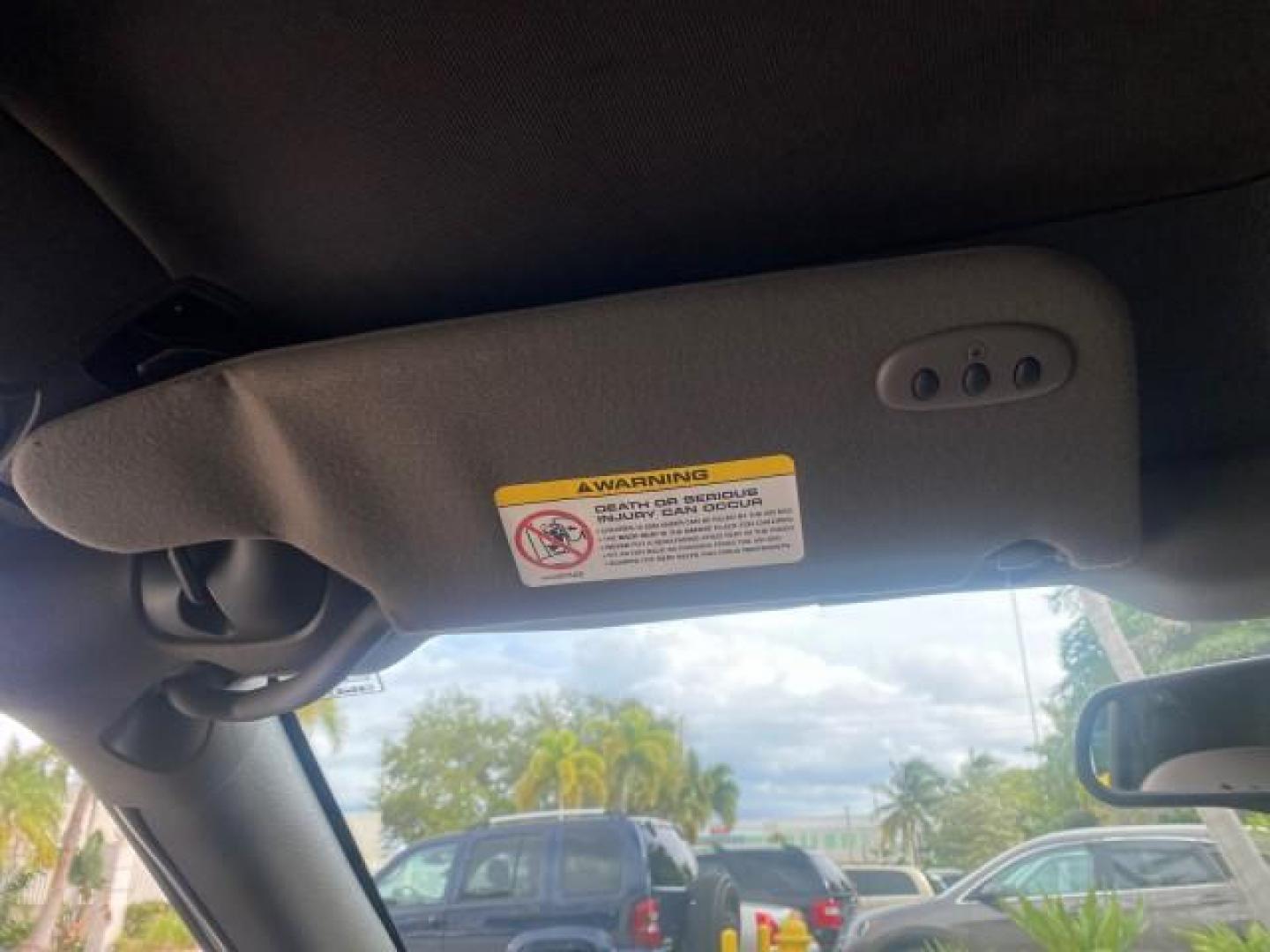 2004 Brilliant Black Crystal Prl /Dark Slate Gray Chrysler Sebring Limited LOW MILES 66,139 (1C3EL65R84N) with an 2.7L MPI DOHC 24-Valve V6 Engine engine, Automatic transmission, located at 4701 North Dixie Hwy, Pompano Beach, FL, 33064, (954) 422-2889, 26.240938, -80.123474 - OUR WEBPAGE FLORIDACARS1.COM HAS OVER 100 PHOTOS AND FREE CARFAX LINK 2004 CHRYSLER SEBRING LIMITED VIN: 1C3EL65R84N154413 1 C 3 E L 6 5 R 8 4 N 1 5 4 4 1 3 CONVERTIBLE 2.7L V6 F DOHC GASOLINE 28 MPG FRONT WHEEL DRIVE Features ABS Brakes Air Conditioning Alloy Wheels AM/FM Stereo Automatic Transmiss - Photo#89