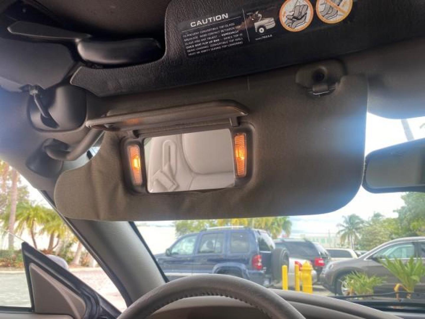 2004 Brilliant Black Crystal Prl /Dark Slate Gray Chrysler Sebring Limited LOW MILES 66,139 (1C3EL65R84N) with an 2.7L MPI DOHC 24-Valve V6 Engine engine, Automatic transmission, located at 4701 North Dixie Hwy, Pompano Beach, FL, 33064, (954) 422-2889, 26.240938, -80.123474 - OUR WEBPAGE FLORIDACARS1.COM HAS OVER 100 PHOTOS AND FREE CARFAX LINK 2004 CHRYSLER SEBRING LIMITED VIN: 1C3EL65R84N154413 1 C 3 E L 6 5 R 8 4 N 1 5 4 4 1 3 CONVERTIBLE 2.7L V6 F DOHC GASOLINE 28 MPG FRONT WHEEL DRIVE Features ABS Brakes Air Conditioning Alloy Wheels AM/FM Stereo Automatic Transmiss - Photo#90