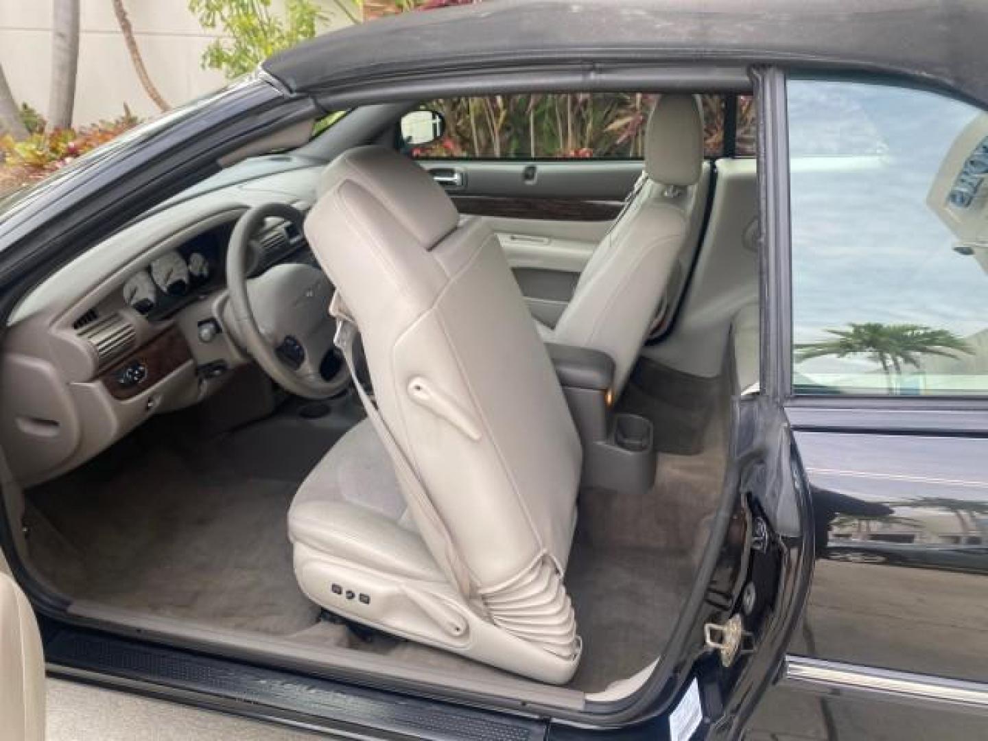 2004 Brilliant Black Crystal Prl /Dark Slate Gray Chrysler Sebring Limited LOW MILES 66,139 (1C3EL65R84N) with an 2.7L MPI DOHC 24-Valve V6 Engine engine, Automatic transmission, located at 4701 North Dixie Hwy, Pompano Beach, FL, 33064, (954) 422-2889, 26.240938, -80.123474 - OUR WEBPAGE FLORIDACARS1.COM HAS OVER 100 PHOTOS AND FREE CARFAX LINK 2004 CHRYSLER SEBRING LIMITED VIN: 1C3EL65R84N154413 1 C 3 E L 6 5 R 8 4 N 1 5 4 4 1 3 CONVERTIBLE 2.7L V6 F DOHC GASOLINE 28 MPG FRONT WHEEL DRIVE Features ABS Brakes Air Conditioning Alloy Wheels AM/FM Stereo Automatic Transmiss - Photo#95