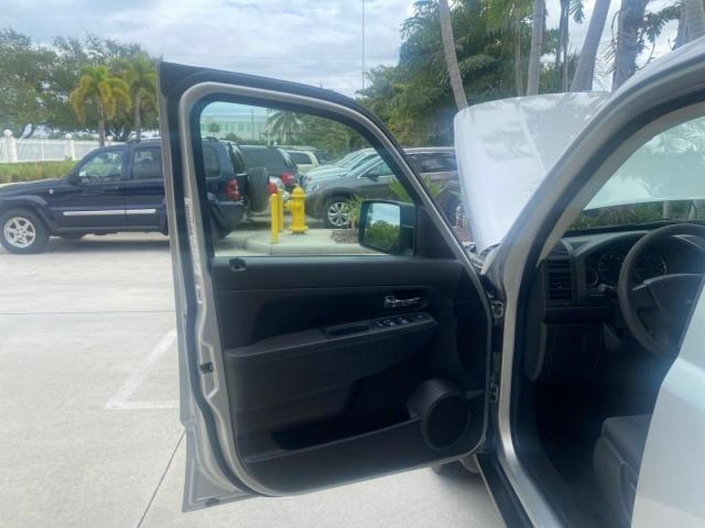 2010 Bright Silver Metallic /Dark slate gray Jeep Liberty Sport 4WD NO ACCIDENTS (1J4PN2GK2AW) with an 3.7L V6 Engine engine, Automatic transmission, located at 4701 North Dixie Hwy, Pompano Beach, FL, 33064, (954) 422-2889, 26.240938, -80.123474 - OUR WEBPAGE FLORIDACARS1.COM HAS OVER 100 PHOTOS AND FREE CARFAX LINK 2010 JEEP LIBERTY SPORT 4WD AMAZING FIND 32 SERVICE RECORDS VIN: 1J4PN2GK2AW182523 1 J 4 P N 2 G K 2 A W 1 8 2 5 2 3 4 DOOR WAGON/SPORT UTILITY 3.7L V6 F SOHC 12V GASOLINE 21 MPG REAR WHEEL DRIVE W/ 4X4 Features ABS Brakes Air Con - Photo#9