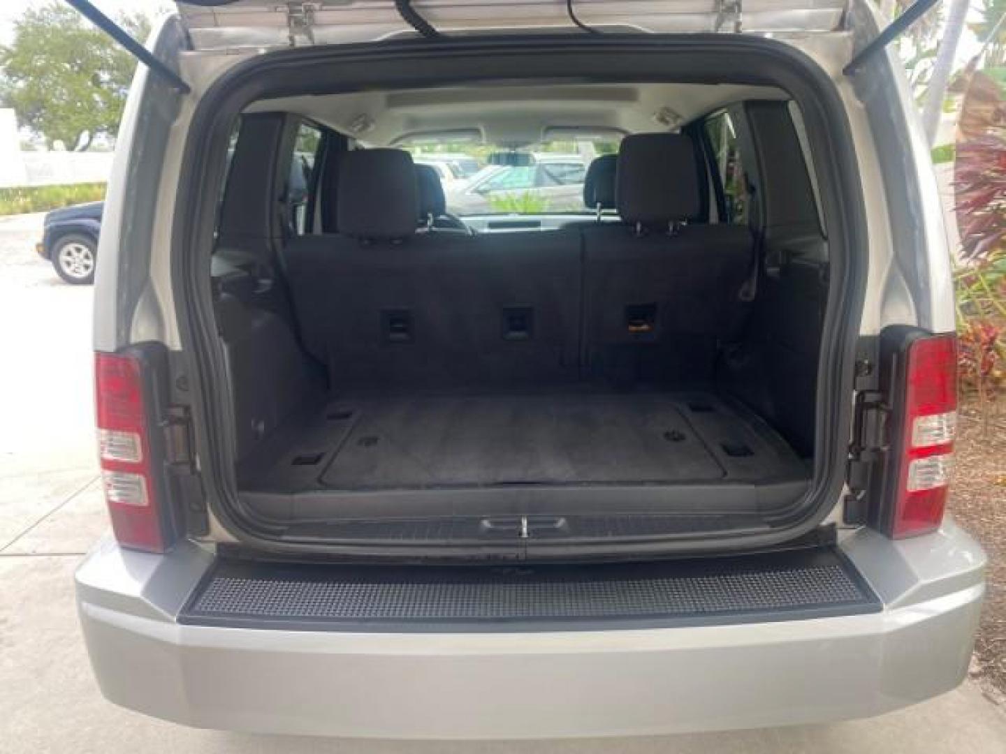 2010 Bright Silver Metallic /Dark slate gray Jeep Liberty Sport 4WD NO ACCIDENTS (1J4PN2GK2AW) with an 3.7L V6 Engine engine, Automatic transmission, located at 4701 North Dixie Hwy, Pompano Beach, FL, 33064, (954) 422-2889, 26.240938, -80.123474 - OUR WEBPAGE FLORIDACARS1.COM HAS OVER 100 PHOTOS AND FREE CARFAX LINK 2010 JEEP LIBERTY SPORT 4WD AMAZING FIND 32 SERVICE RECORDS VIN: 1J4PN2GK2AW182523 1 J 4 P N 2 G K 2 A W 1 8 2 5 2 3 4 DOOR WAGON/SPORT UTILITY 3.7L V6 F SOHC 12V GASOLINE 21 MPG REAR WHEEL DRIVE W/ 4X4 Features ABS Brakes Air Con - Photo#96