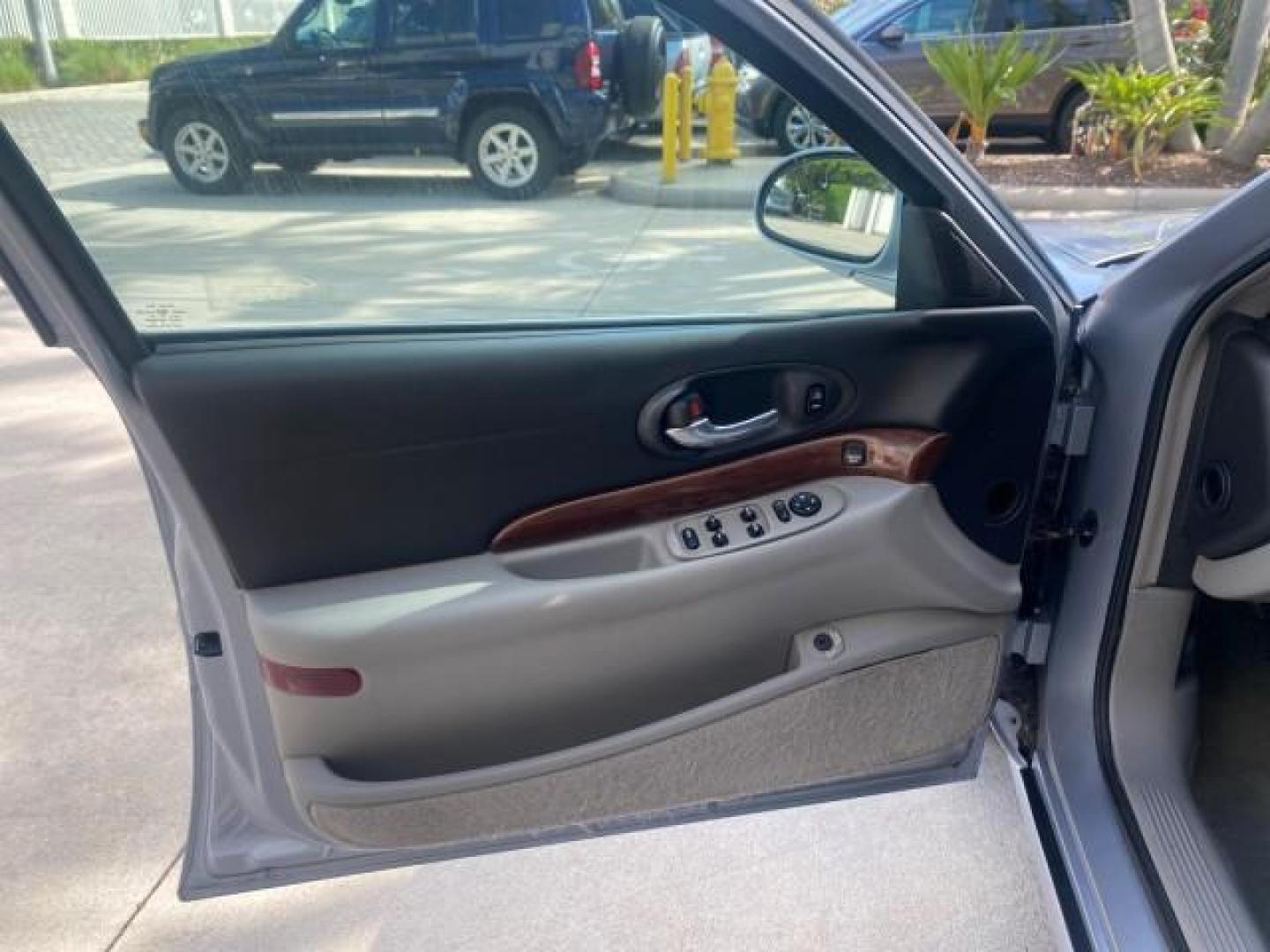 2005 Ming Blue Metallic /Gray Buick LeSabre LEATHER LOW MILES 62,243 (1G4HP54KX5U) with an 3.8L 3800 V6 SFI Engine engine, Automatic transmission, located at 4701 North Dixie Hwy, Pompano Beach, FL, 33064, (954) 422-2889, 26.240938, -80.123474 - OUR WEBPAGE FLORIDACARS1.COM HAS OVER 100 PHOTOS AND FREE CARFAX LINK 2005 BUICK LESABRE LEATHER LOADED RUNS LIKE NEW VIN: 1G4HP54KX5U177562 1 G 4 H P 5 4 K X 5 U 1 7 7 5 6 2 SEDAN 4 DR 3.8L V6 F OHV GASOLINE 29 MPG FRONT WHEEL DRIVE Features ABS Brakes Air Conditioning Alloy Wheels AM/FM Stereo Aut - Photo#43