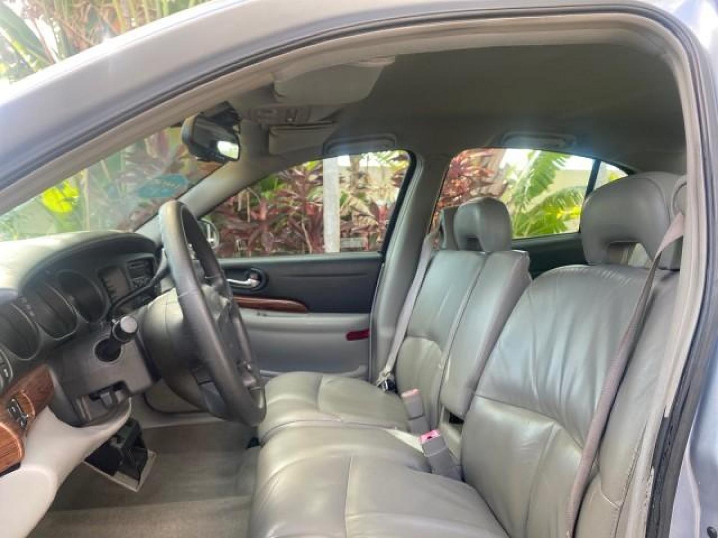 2005 Ming Blue Metallic /Gray Buick LeSabre LEATHER LOW MILES 62,243 (1G4HP54KX5U) with an 3.8L 3800 V6 SFI Engine engine, Automatic transmission, located at 4701 North Dixie Hwy, Pompano Beach, FL, 33064, (954) 422-2889, 26.240938, -80.123474 - OUR WEBPAGE FLORIDACARS1.COM HAS OVER 100 PHOTOS AND FREE CARFAX LINK 2005 BUICK LESABRE LEATHER LOADED RUNS LIKE NEW VIN: 1G4HP54KX5U177562 1 G 4 H P 5 4 K X 5 U 1 7 7 5 6 2 SEDAN 4 DR 3.8L V6 F OHV GASOLINE 29 MPG FRONT WHEEL DRIVE Features ABS Brakes Air Conditioning Alloy Wheels AM/FM Stereo Aut - Photo#45