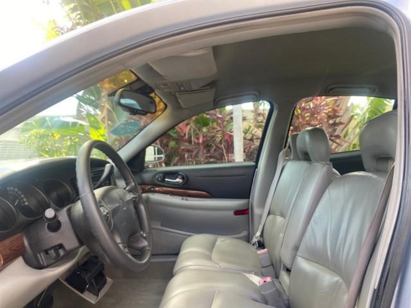 2005 Ming Blue Metallic /Gray Buick LeSabre LEATHER LOW MILES 62,243 (1G4HP54KX5U) with an 3.8L 3800 V6 SFI Engine engine, Automatic transmission, located at 4701 North Dixie Hwy, Pompano Beach, FL, 33064, (954) 422-2889, 26.240938, -80.123474 - OUR WEBPAGE FLORIDACARS1.COM HAS OVER 100 PHOTOS AND FREE CARFAX LINK 2005 BUICK LESABRE LEATHER LOADED RUNS LIKE NEW VIN: 1G4HP54KX5U177562 1 G 4 H P 5 4 K X 5 U 1 7 7 5 6 2 SEDAN 4 DR 3.8L V6 F OHV GASOLINE 29 MPG FRONT WHEEL DRIVE Features ABS Brakes Air Conditioning Alloy Wheels AM/FM Stereo Aut - Photo#47