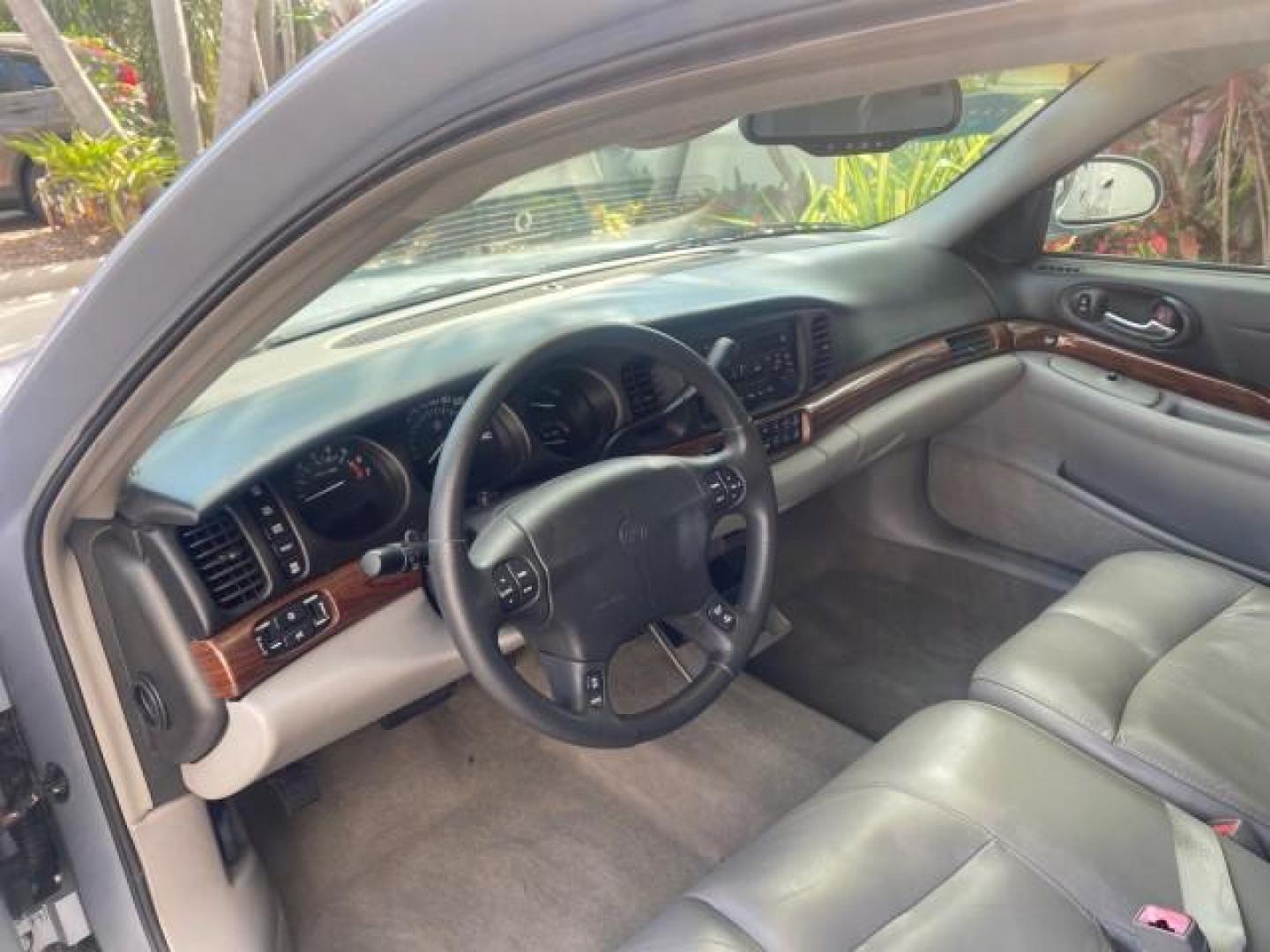 2005 Ming Blue Metallic /Gray Buick LeSabre LEATHER LOW MILES 62,243 (1G4HP54KX5U) with an 3.8L 3800 V6 SFI Engine engine, Automatic transmission, located at 4701 North Dixie Hwy, Pompano Beach, FL, 33064, (954) 422-2889, 26.240938, -80.123474 - OUR WEBPAGE FLORIDACARS1.COM HAS OVER 100 PHOTOS AND FREE CARFAX LINK 2005 BUICK LESABRE LEATHER LOADED RUNS LIKE NEW VIN: 1G4HP54KX5U177562 1 G 4 H P 5 4 K X 5 U 1 7 7 5 6 2 SEDAN 4 DR 3.8L V6 F OHV GASOLINE 29 MPG FRONT WHEEL DRIVE Features ABS Brakes Air Conditioning Alloy Wheels AM/FM Stereo Aut - Photo#49