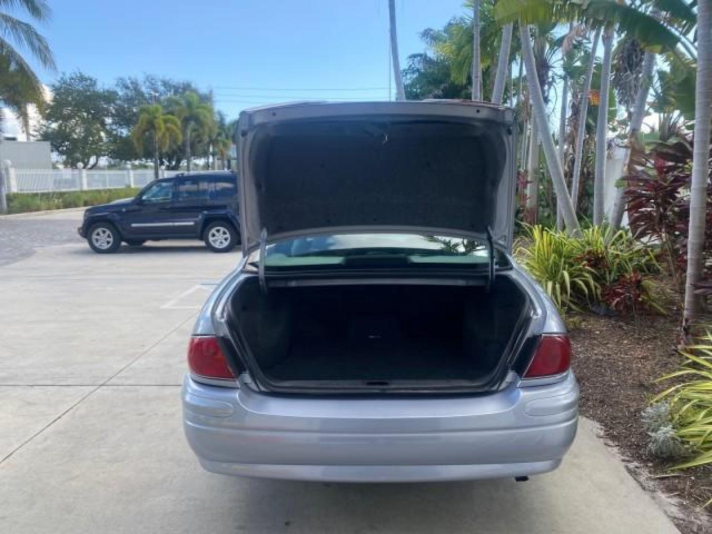 2005 Ming Blue Metallic /Gray Buick LeSabre LEATHER LOW MILES 62,243 (1G4HP54KX5U) with an 3.8L 3800 V6 SFI Engine engine, Automatic transmission, located at 4701 North Dixie Hwy, Pompano Beach, FL, 33064, (954) 422-2889, 26.240938, -80.123474 - OUR WEBPAGE FLORIDACARS1.COM HAS OVER 100 PHOTOS AND FREE CARFAX LINK 2005 BUICK LESABRE LEATHER LOADED RUNS LIKE NEW VIN: 1G4HP54KX5U177562 1 G 4 H P 5 4 K X 5 U 1 7 7 5 6 2 SEDAN 4 DR 3.8L V6 F OHV GASOLINE 29 MPG FRONT WHEEL DRIVE Features ABS Brakes Air Conditioning Alloy Wheels AM/FM Stereo Aut - Photo#87