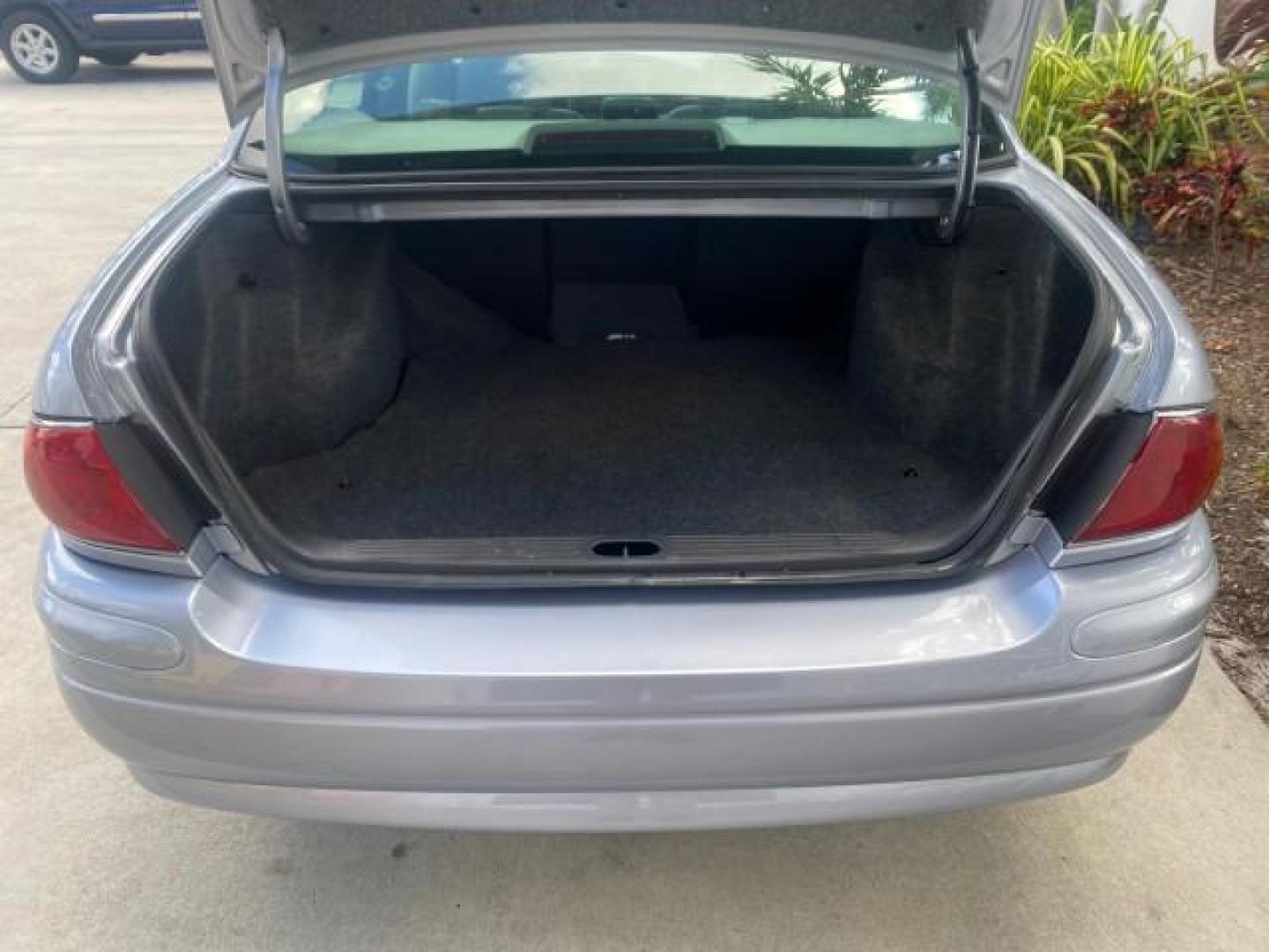 2005 Ming Blue Metallic /Gray Buick LeSabre LEATHER LOW MILES 62,243 (1G4HP54KX5U) with an 3.8L 3800 V6 SFI Engine engine, Automatic transmission, located at 4701 North Dixie Hwy, Pompano Beach, FL, 33064, (954) 422-2889, 26.240938, -80.123474 - OUR WEBPAGE FLORIDACARS1.COM HAS OVER 100 PHOTOS AND FREE CARFAX LINK 2005 BUICK LESABRE LEATHER LOADED RUNS LIKE NEW VIN: 1G4HP54KX5U177562 1 G 4 H P 5 4 K X 5 U 1 7 7 5 6 2 SEDAN 4 DR 3.8L V6 F OHV GASOLINE 29 MPG FRONT WHEEL DRIVE Features ABS Brakes Air Conditioning Alloy Wheels AM/FM Stereo Aut - Photo#88