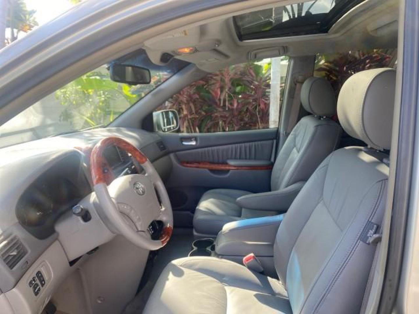 2007 Silver Shadow Pearl /Taupe Toyota Sienna XLE LTD 1 OWNER (5TDZK22C57S) with an 3.5L V6 Cylinder Engine engine, Automatic transmission, located at 4701 North Dixie Hwy, Pompano Beach, FL, 33064, (954) 422-2889, 26.240938, -80.123474 - OUR WEBPAGE FLORIDACARS1.COM HAS OVER 100 PHOTOS AND FREE CARFAX LINK 2007 TOYOTA SIENNA XLE 7-PASSENGER VIN: 5TDZK22C57S074901 5 T D Z K 2 2 C 5 7 S 0 7 4 9 0 1 VAN 3.5L V6 F DOHC 24V GASOLINE 26 MPG FRONT WHEEL DRIVE Features ABS Brakes Air Conditioning Alloy Wheels AM/FM Stereo Automatic Transmis - Photo#46