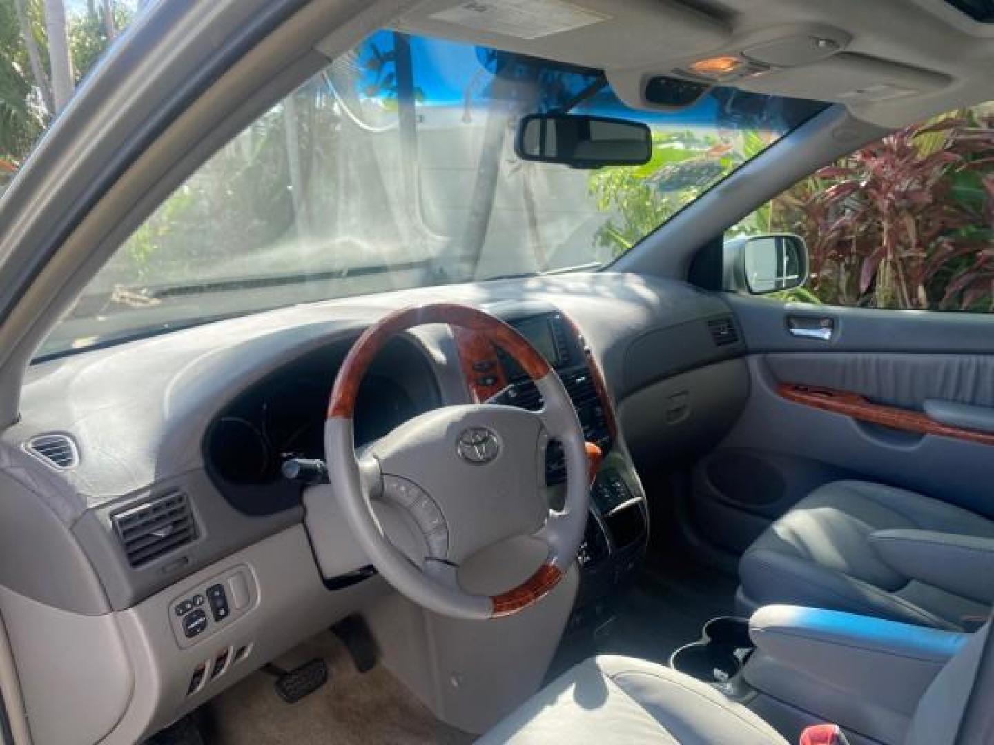 2007 Silver Shadow Pearl /Taupe Toyota Sienna XLE LTD 1 OWNER (5TDZK22C57S) with an 3.5L V6 Cylinder Engine engine, Automatic transmission, located at 4701 North Dixie Hwy, Pompano Beach, FL, 33064, (954) 422-2889, 26.240938, -80.123474 - OUR WEBPAGE FLORIDACARS1.COM HAS OVER 100 PHOTOS AND FREE CARFAX LINK 2007 TOYOTA SIENNA XLE 7-PASSENGER VIN: 5TDZK22C57S074901 5 T D Z K 2 2 C 5 7 S 0 7 4 9 0 1 VAN 3.5L V6 F DOHC 24V GASOLINE 26 MPG FRONT WHEEL DRIVE Features ABS Brakes Air Conditioning Alloy Wheels AM/FM Stereo Automatic Transmis - Photo#49