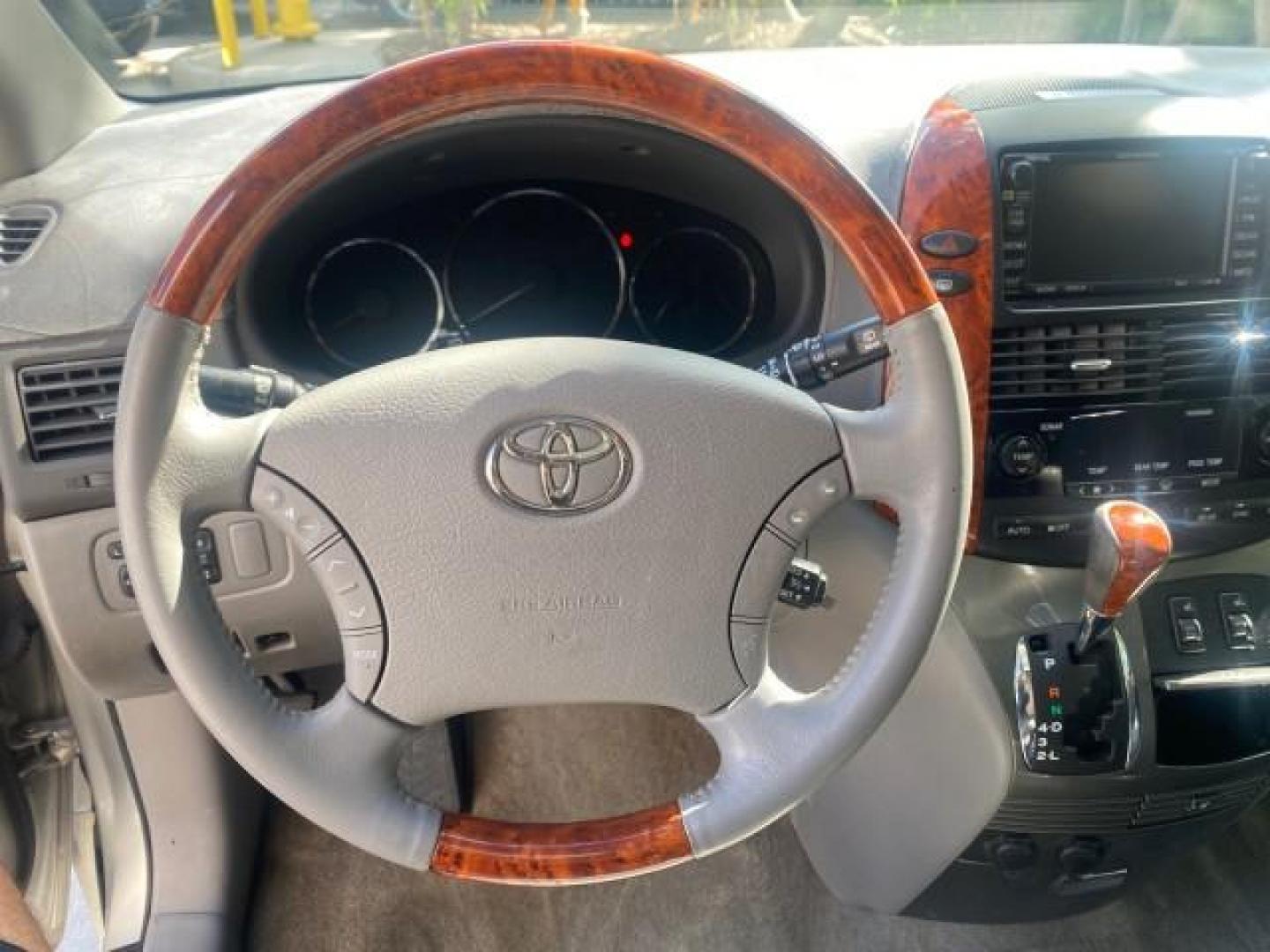 2007 Silver Shadow Pearl /Taupe Toyota Sienna XLE LTD 1 OWNER (5TDZK22C57S) with an 3.5L V6 Cylinder Engine engine, Automatic transmission, located at 4701 North Dixie Hwy, Pompano Beach, FL, 33064, (954) 422-2889, 26.240938, -80.123474 - OUR WEBPAGE FLORIDACARS1.COM HAS OVER 100 PHOTOS AND FREE CARFAX LINK 2007 TOYOTA SIENNA XLE 7-PASSENGER VIN: 5TDZK22C57S074901 5 T D Z K 2 2 C 5 7 S 0 7 4 9 0 1 VAN 3.5L V6 F DOHC 24V GASOLINE 26 MPG FRONT WHEEL DRIVE Features ABS Brakes Air Conditioning Alloy Wheels AM/FM Stereo Automatic Transmis - Photo#50