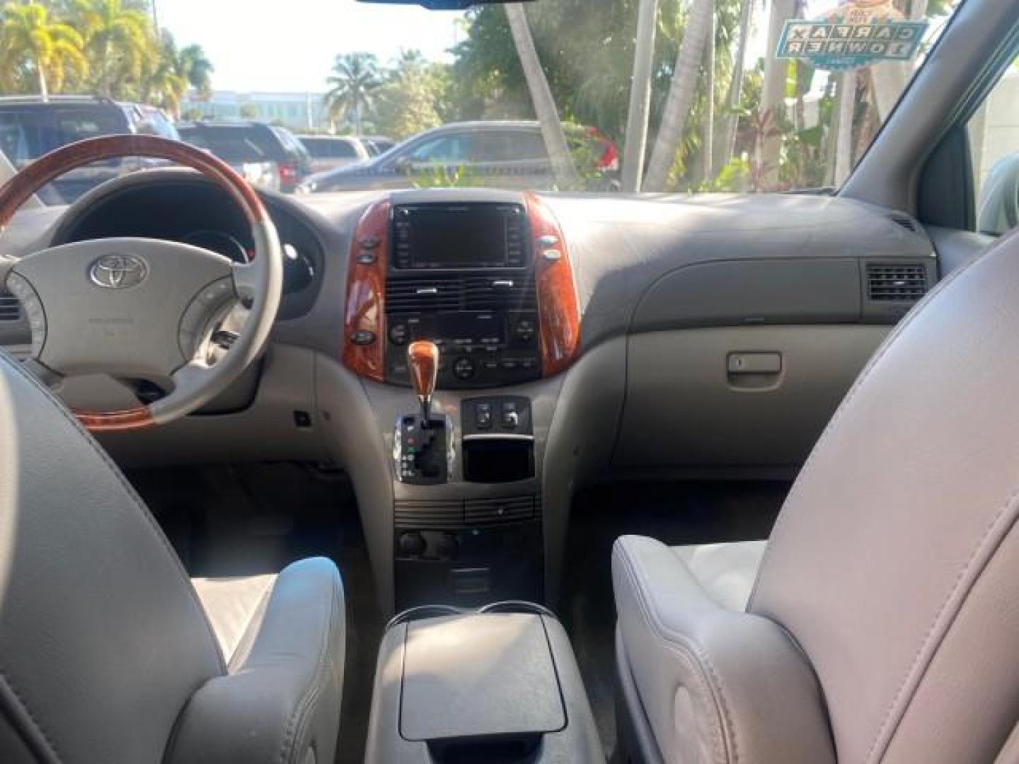 2007 Silver Shadow Pearl /Taupe Toyota Sienna XLE LTD 1 OWNER (5TDZK22C57S) with an 3.5L V6 Cylinder Engine engine, Automatic transmission, located at 4701 North Dixie Hwy, Pompano Beach, FL, 33064, (954) 422-2889, 26.240938, -80.123474 - OUR WEBPAGE FLORIDACARS1.COM HAS OVER 100 PHOTOS AND FREE CARFAX LINK 2007 TOYOTA SIENNA XLE 7-PASSENGER VIN: 5TDZK22C57S074901 5 T D Z K 2 2 C 5 7 S 0 7 4 9 0 1 VAN 3.5L V6 F DOHC 24V GASOLINE 26 MPG FRONT WHEEL DRIVE Features ABS Brakes Air Conditioning Alloy Wheels AM/FM Stereo Automatic Transmis - Photo#83