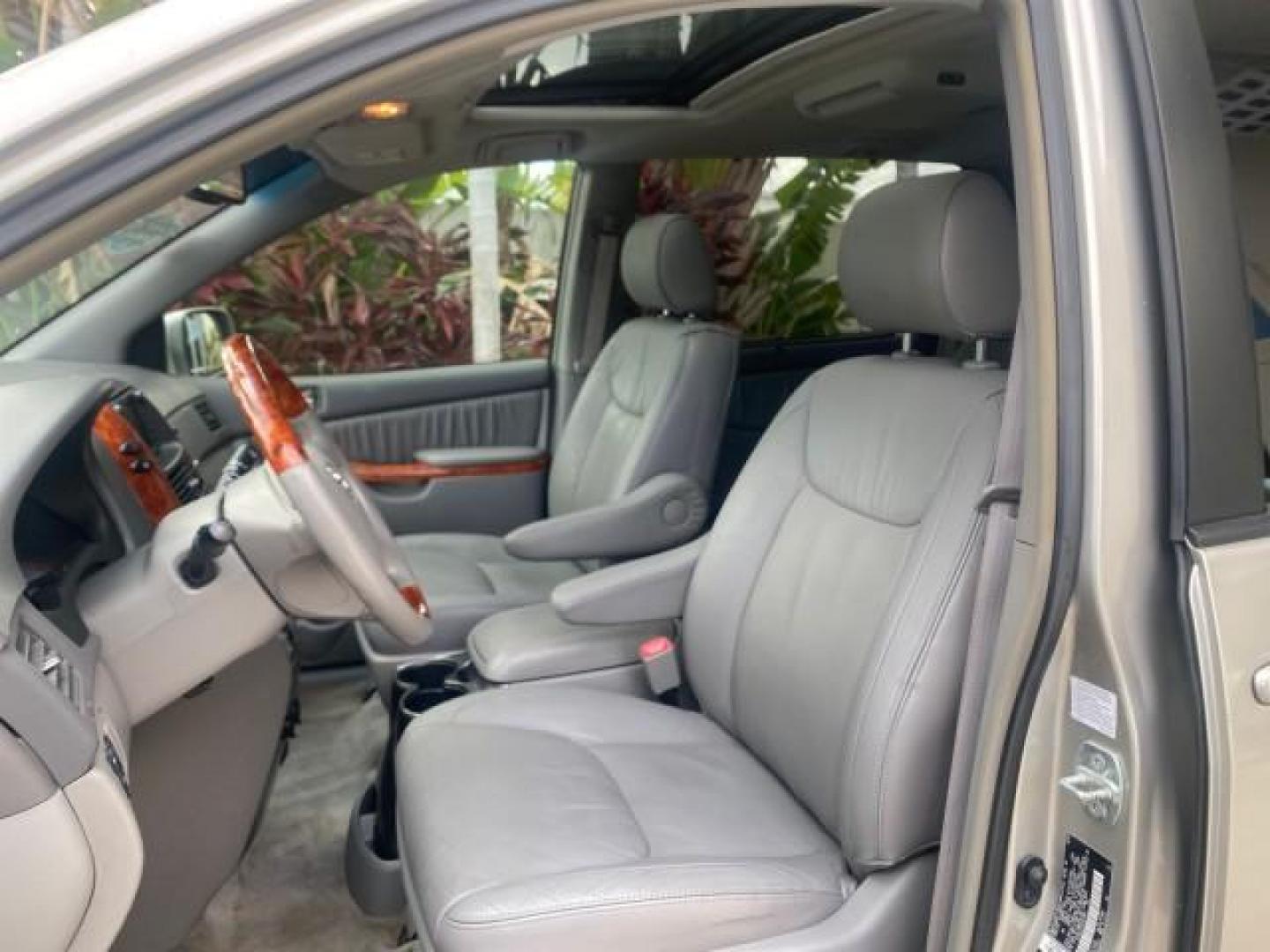 2007 Silver Shadow Pearl /Taupe Toyota Sienna XLE LTD 1 OWNER (5TDZK22C57S) with an 3.5L V6 Cylinder Engine engine, Automatic transmission, located at 4701 North Dixie Hwy, Pompano Beach, FL, 33064, (954) 422-2889, 26.240938, -80.123474 - OUR WEBPAGE FLORIDACARS1.COM HAS OVER 100 PHOTOS AND FREE CARFAX LINK 2007 TOYOTA SIENNA XLE 7-PASSENGER VIN: 5TDZK22C57S074901 5 T D Z K 2 2 C 5 7 S 0 7 4 9 0 1 VAN 3.5L V6 F DOHC 24V GASOLINE 26 MPG FRONT WHEEL DRIVE Features ABS Brakes Air Conditioning Alloy Wheels AM/FM Stereo Automatic Transmis - Photo#43