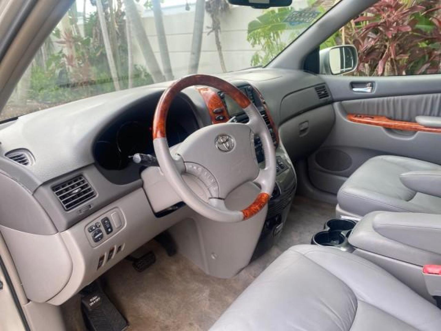 2007 Silver Shadow Pearl /Taupe Toyota Sienna XLE LTD 1 OWNER (5TDZK22C57S) with an 3.5L V6 Cylinder Engine engine, Automatic transmission, located at 4701 North Dixie Hwy, Pompano Beach, FL, 33064, (954) 422-2889, 26.240938, -80.123474 - OUR WEBPAGE FLORIDACARS1.COM HAS OVER 100 PHOTOS AND FREE CARFAX LINK 2007 TOYOTA SIENNA XLE 7-PASSENGER VIN: 5TDZK22C57S074901 5 T D Z K 2 2 C 5 7 S 0 7 4 9 0 1 VAN 3.5L V6 F DOHC 24V GASOLINE 26 MPG FRONT WHEEL DRIVE Features ABS Brakes Air Conditioning Alloy Wheels AM/FM Stereo Automatic Transmis - Photo#48