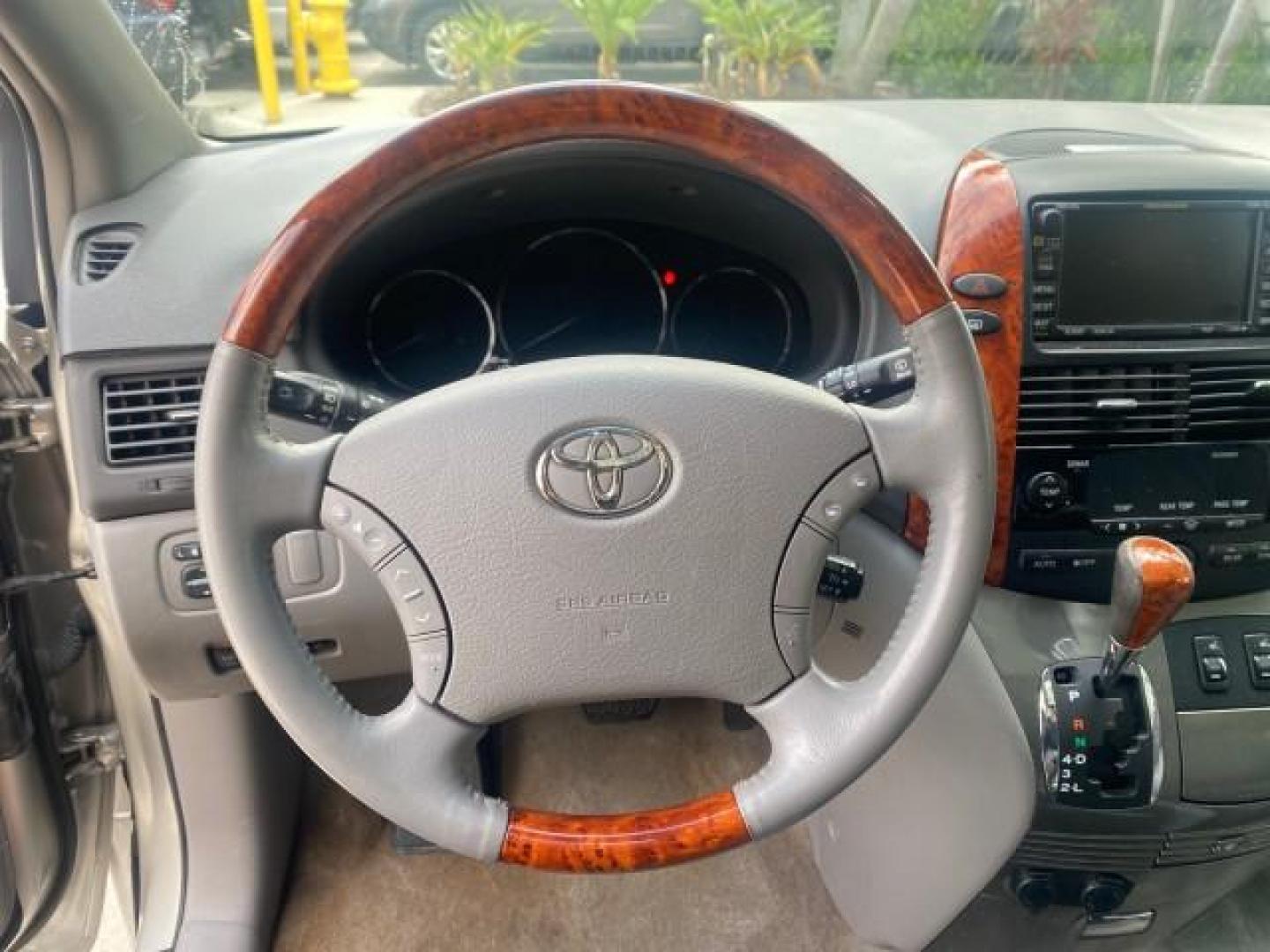 2007 Silver Shadow Pearl /Taupe Toyota Sienna XLE LTD 1 OWNER (5TDZK22C57S) with an 3.5L V6 Cylinder Engine engine, Automatic transmission, located at 4701 North Dixie Hwy, Pompano Beach, FL, 33064, (954) 422-2889, 26.240938, -80.123474 - OUR WEBPAGE FLORIDACARS1.COM HAS OVER 100 PHOTOS AND FREE CARFAX LINK 2007 TOYOTA SIENNA XLE 7-PASSENGER VIN: 5TDZK22C57S074901 5 T D Z K 2 2 C 5 7 S 0 7 4 9 0 1 VAN 3.5L V6 F DOHC 24V GASOLINE 26 MPG FRONT WHEEL DRIVE Features ABS Brakes Air Conditioning Alloy Wheels AM/FM Stereo Automatic Transmis - Photo#50