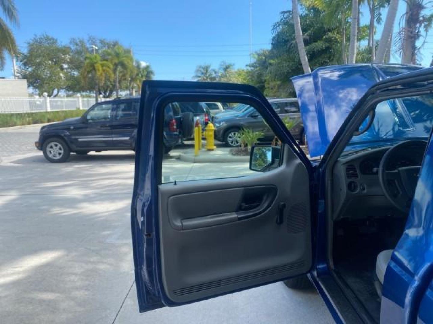 2011 Vista Blue Metallic /Medium Dark Flint Ford Ranger XL LOW MILES 22,154 1 OWNER (1FTKR1ADXBP) with an 2.3L DOHC 16-Valve I4 Engine engine, Automatic transmission, located at 4701 North Dixie Hwy, Pompano Beach, FL, 33064, (954) 422-2889, 26.240938, -80.123474 - OUR WEBPAGE FLORIDACARS1.COM HAS OVER 100 PHOTOS AND FREE CARFAX LINK 2011 FORD RANGER XL VIN: 1FTKR1ADXBPA41493 1 F T K R 1 A D X B P A 4 1 4 9 3 PICKUP 2.3L I4 F DOHC 16V GASOLINE 27 MPG REAR WHEEL DRIVE Features ABS Brakes Air Conditioning AM/FM Stereo Automatic Transmission Bed Liner Side Airbag - Photo#9