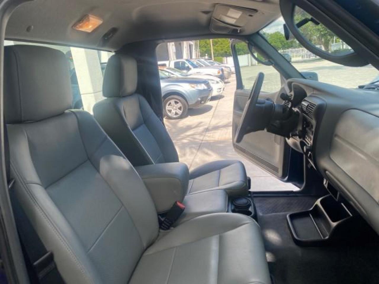 2011 Vista Blue Metallic /Medium Dark Flint Ford Ranger XL LOW MILES 22,154 1 OWNER (1FTKR1ADXBP) with an 2.3L DOHC 16-Valve I4 Engine engine, Automatic transmission, located at 4701 North Dixie Hwy, Pompano Beach, FL, 33064, (954) 422-2889, 26.240938, -80.123474 - OUR WEBPAGE FLORIDACARS1.COM HAS OVER 100 PHOTOS AND FREE CARFAX LINK 2011 FORD RANGER XL VIN: 1FTKR1ADXBPA41493 1 F T K R 1 A D X B P A 4 1 4 9 3 PICKUP 2.3L I4 F DOHC 16V GASOLINE 27 MPG REAR WHEEL DRIVE Features ABS Brakes Air Conditioning AM/FM Stereo Automatic Transmission Bed Liner Side Airbag - Photo#12