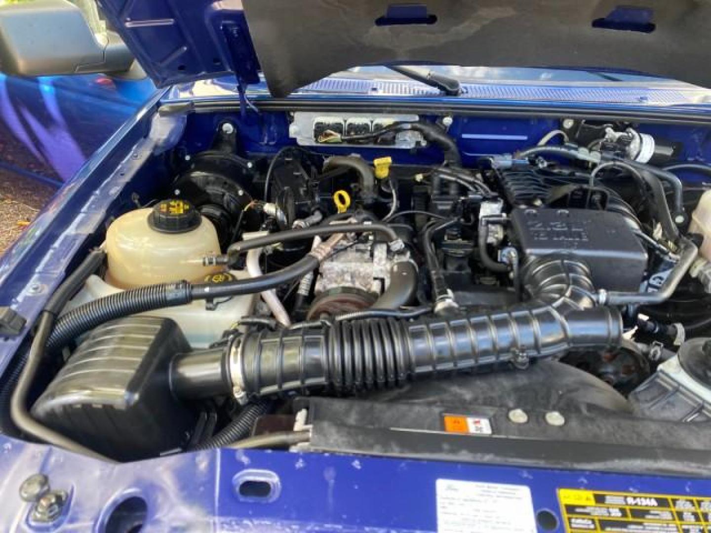 2011 Vista Blue Metallic /Medium Dark Flint Ford Ranger XL LOW MILES 22,154 1 OWNER (1FTKR1ADXBP) with an 2.3L DOHC 16-Valve I4 Engine engine, Automatic transmission, located at 4701 North Dixie Hwy, Pompano Beach, FL, 33064, (954) 422-2889, 26.240938, -80.123474 - OUR WEBPAGE FLORIDACARS1.COM HAS OVER 100 PHOTOS AND FREE CARFAX LINK 2011 FORD RANGER XL VIN: 1FTKR1ADXBPA41493 1 F T K R 1 A D X B P A 4 1 4 9 3 PICKUP 2.3L I4 F DOHC 16V GASOLINE 27 MPG REAR WHEEL DRIVE Features ABS Brakes Air Conditioning AM/FM Stereo Automatic Transmission Bed Liner Side Airbag - Photo#25