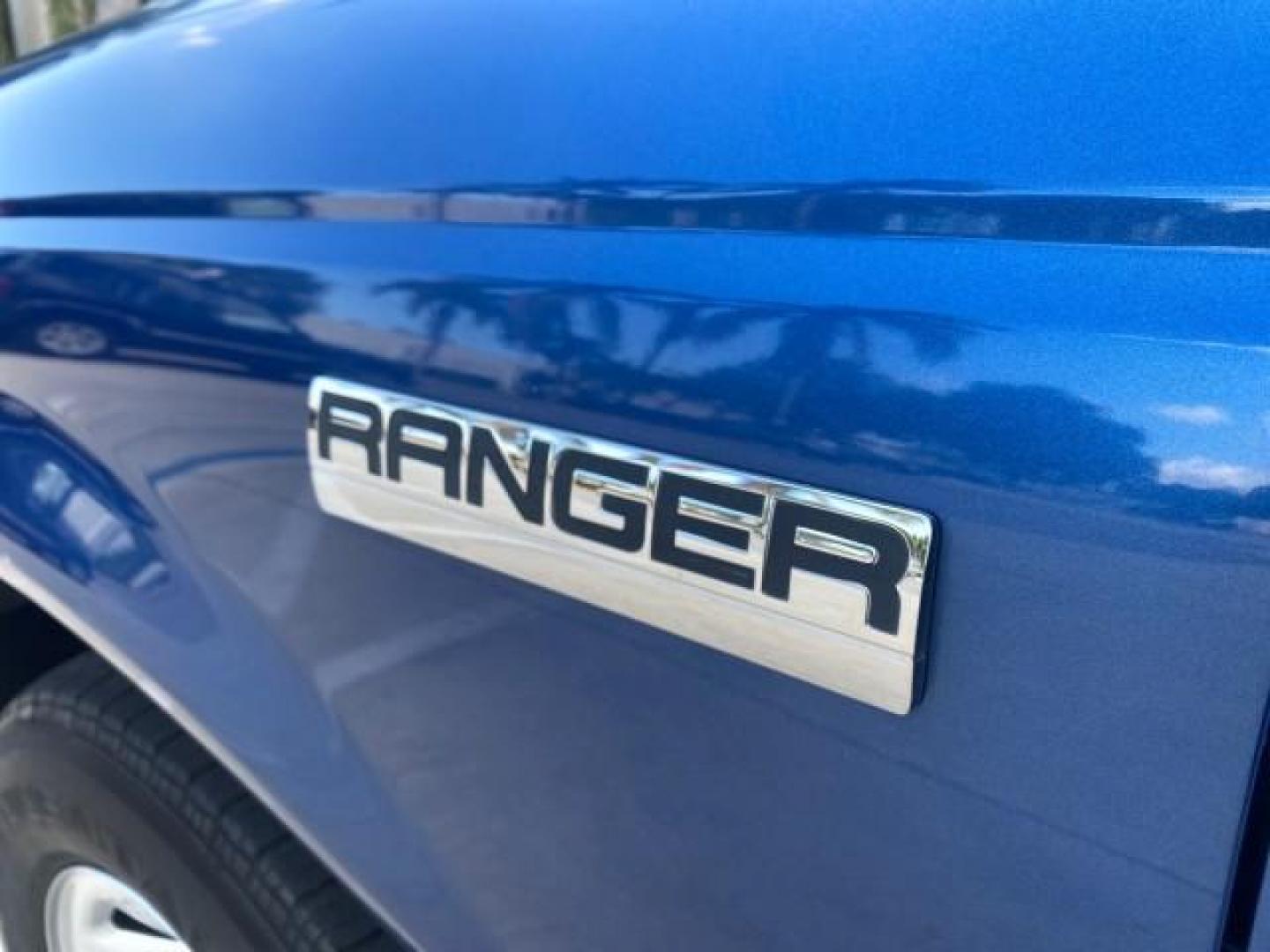 2011 Vista Blue Metallic /Medium Dark Flint Ford Ranger XL LOW MILES 22,154 1 OWNER (1FTKR1ADXBP) with an 2.3L DOHC 16-Valve I4 Engine engine, Automatic transmission, located at 4701 North Dixie Hwy, Pompano Beach, FL, 33064, (954) 422-2889, 26.240938, -80.123474 - OUR WEBPAGE FLORIDACARS1.COM HAS OVER 100 PHOTOS AND FREE CARFAX LINK 2011 FORD RANGER XL VIN: 1FTKR1ADXBPA41493 1 F T K R 1 A D X B P A 4 1 4 9 3 PICKUP 2.3L I4 F DOHC 16V GASOLINE 27 MPG REAR WHEEL DRIVE Features ABS Brakes Air Conditioning AM/FM Stereo Automatic Transmission Bed Liner Side Airbag - Photo#41