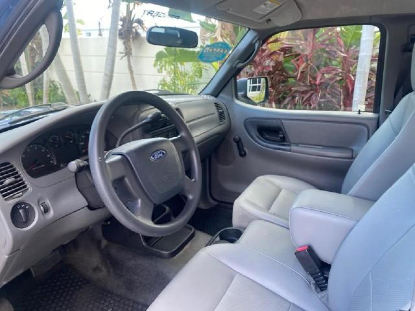 2011 Vista Blue Metallic /Medium Dark Flint Ford Ranger XL LOW MILES 22,154 1 OWNER (1FTKR1ADXBP) with an 2.3L DOHC 16-Valve I4 Engine engine, Automatic transmission, located at 4701 North Dixie Hwy, Pompano Beach, FL, 33064, (954) 422-2889, 26.240938, -80.123474 - OUR WEBPAGE FLORIDACARS1.COM HAS OVER 100 PHOTOS AND FREE CARFAX LINK 2011 FORD RANGER XL VIN: 1FTKR1ADXBPA41493 1 F T K R 1 A D X B P A 4 1 4 9 3 PICKUP 2.3L I4 F DOHC 16V GASOLINE 27 MPG REAR WHEEL DRIVE Features ABS Brakes Air Conditioning AM/FM Stereo Automatic Transmission Bed Liner Side Airbag - Photo#49