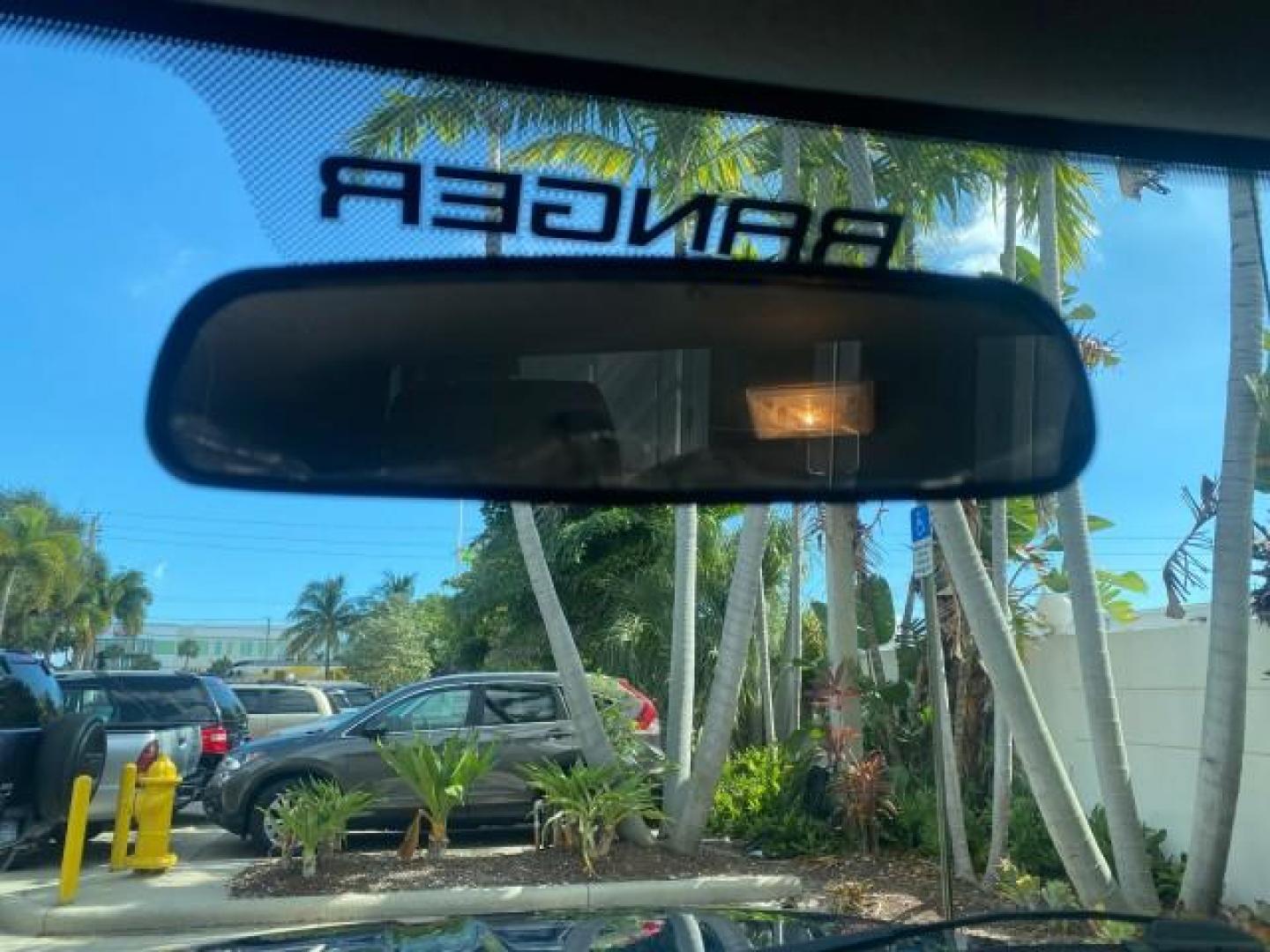 2011 Vista Blue Metallic /Medium Dark Flint Ford Ranger XL LOW MILES 22,154 1 OWNER (1FTKR1ADXBP) with an 2.3L DOHC 16-Valve I4 Engine engine, Automatic transmission, located at 4701 North Dixie Hwy, Pompano Beach, FL, 33064, (954) 422-2889, 26.240938, -80.123474 - OUR WEBPAGE FLORIDACARS1.COM HAS OVER 100 PHOTOS AND FREE CARFAX LINK 2011 FORD RANGER XL VIN: 1FTKR1ADXBPA41493 1 F T K R 1 A D X B P A 4 1 4 9 3 PICKUP 2.3L I4 F DOHC 16V GASOLINE 27 MPG REAR WHEEL DRIVE Features ABS Brakes Air Conditioning AM/FM Stereo Automatic Transmission Bed Liner Side Airbag - Photo#66